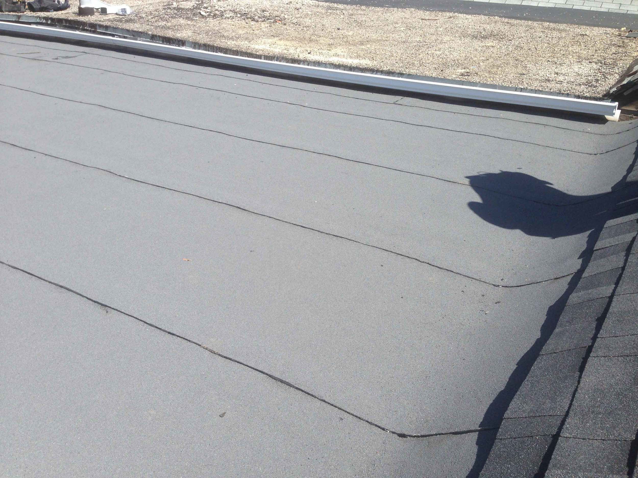 Done; included fixing the neighbours eaves which ran water between the houses and onto this roof.