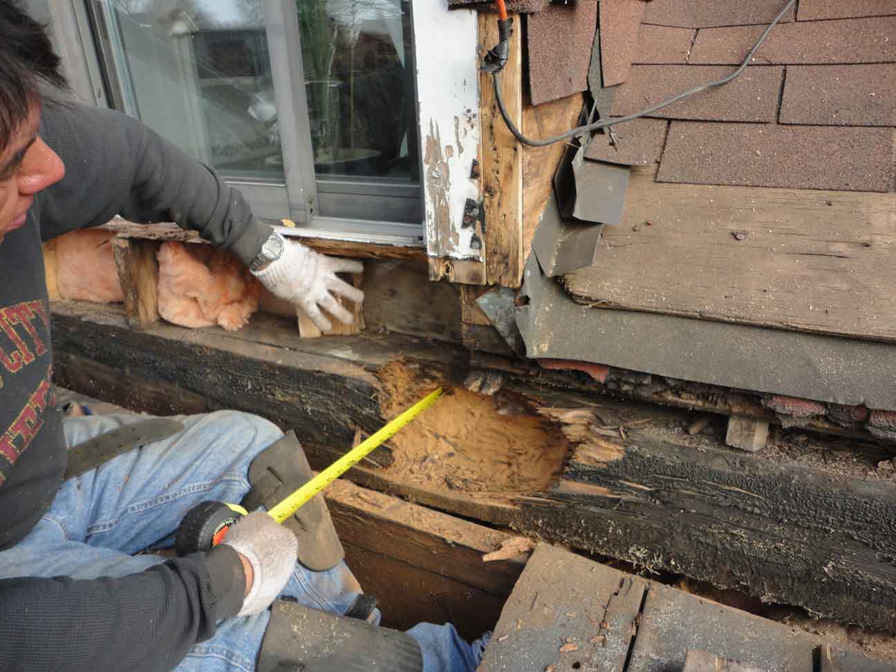 Very important structure (4 beams) is rotted out. Actual rot is through two beams fully and partially into the third. These beams hold up the back shingled roof and the patio door etc...