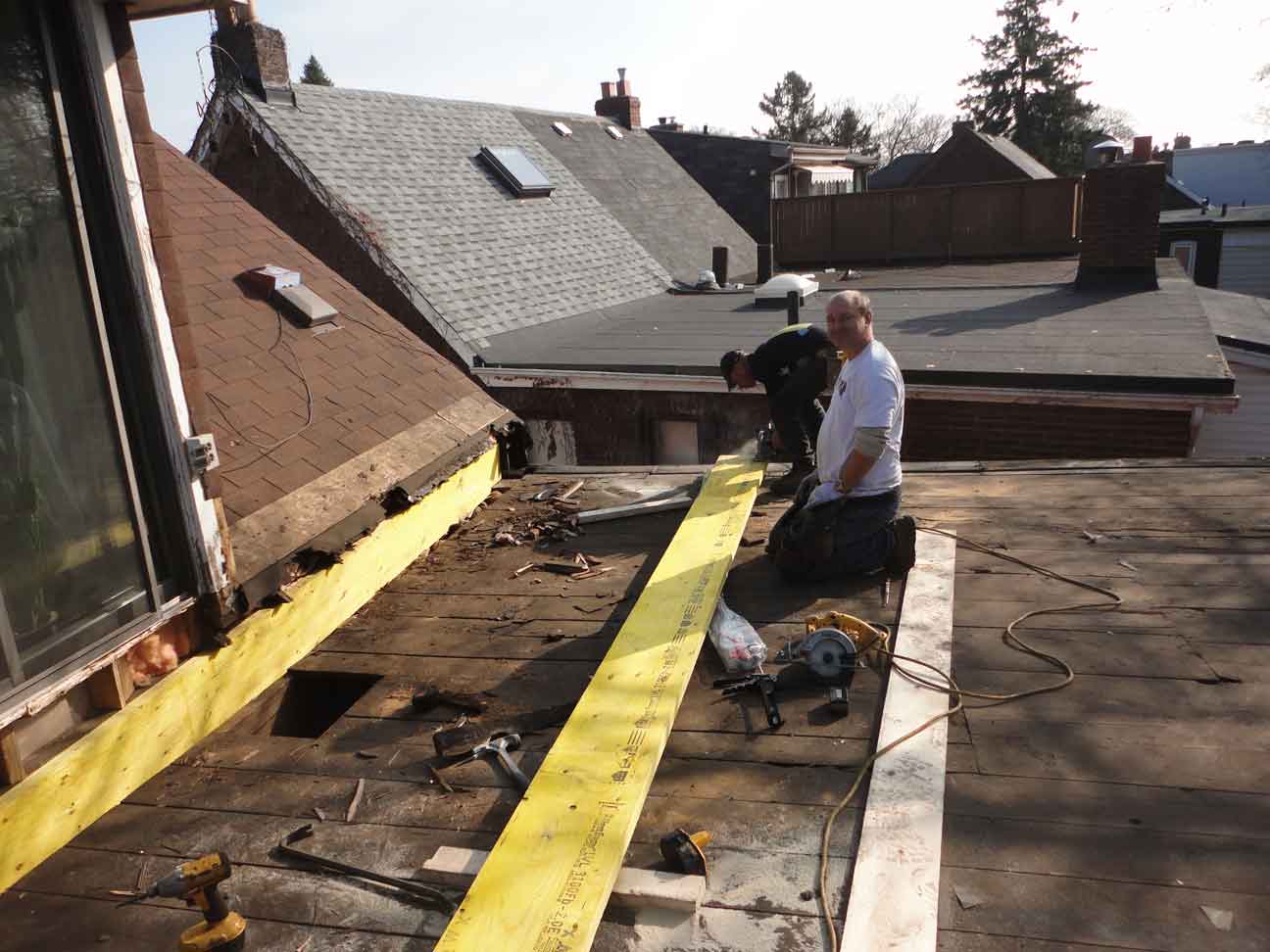 Removed two of the rotted beams and installing stronger ones (glued together etc..).