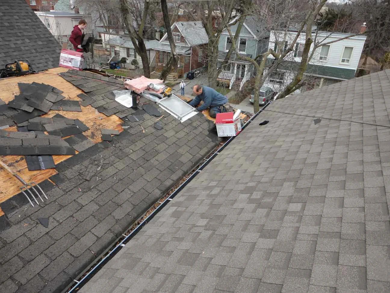 Roofing coming off. One new bathroom fan going in.