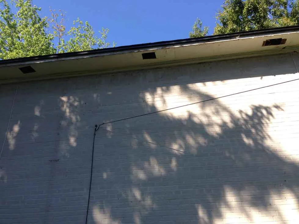 Overhang of house removed of all old aluminum.