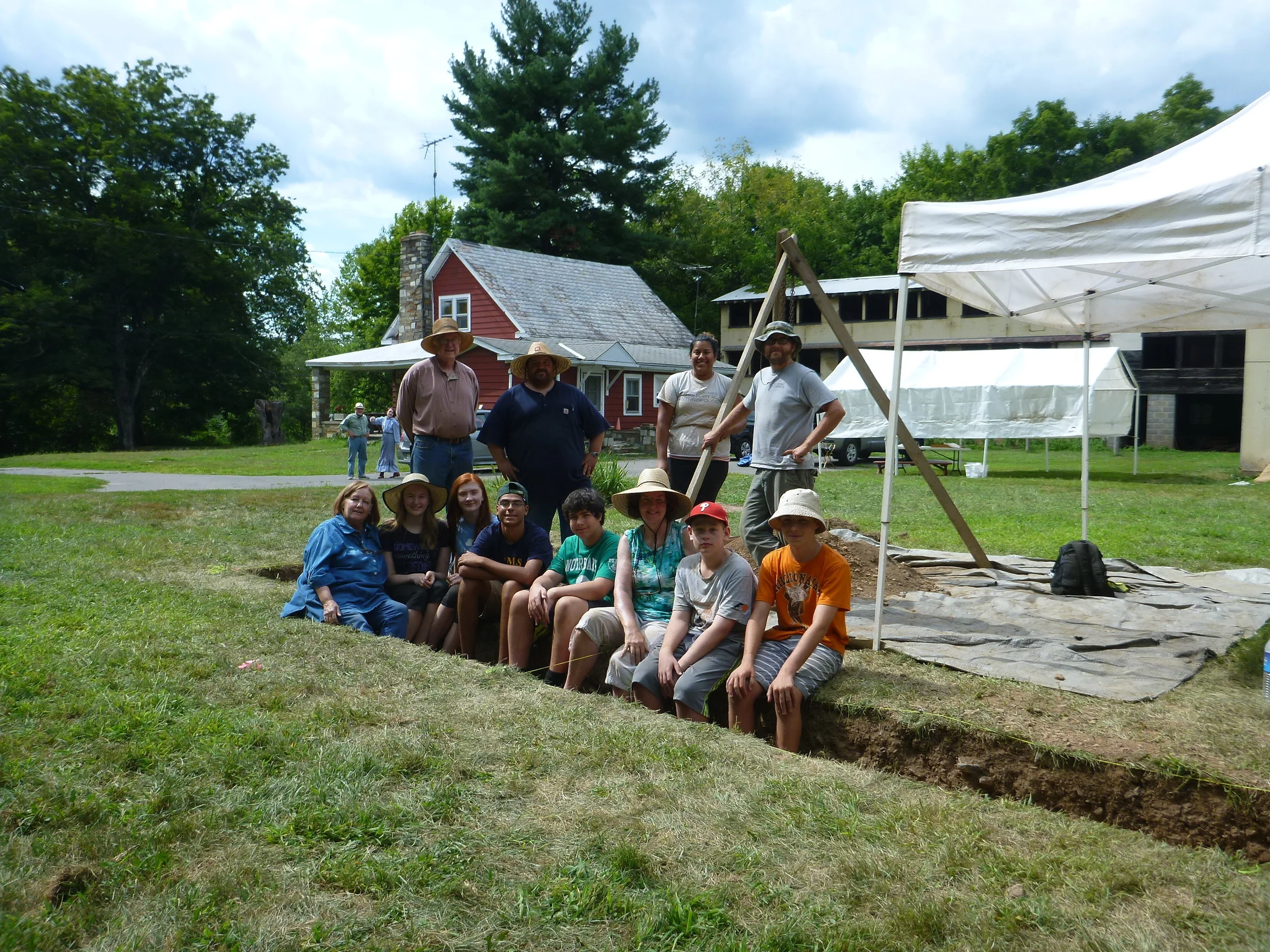 A group of trainee archaeologists, Howell Living History Farm staff and Hunter Research archaeologists at the end of the first week of the archaeology camp.