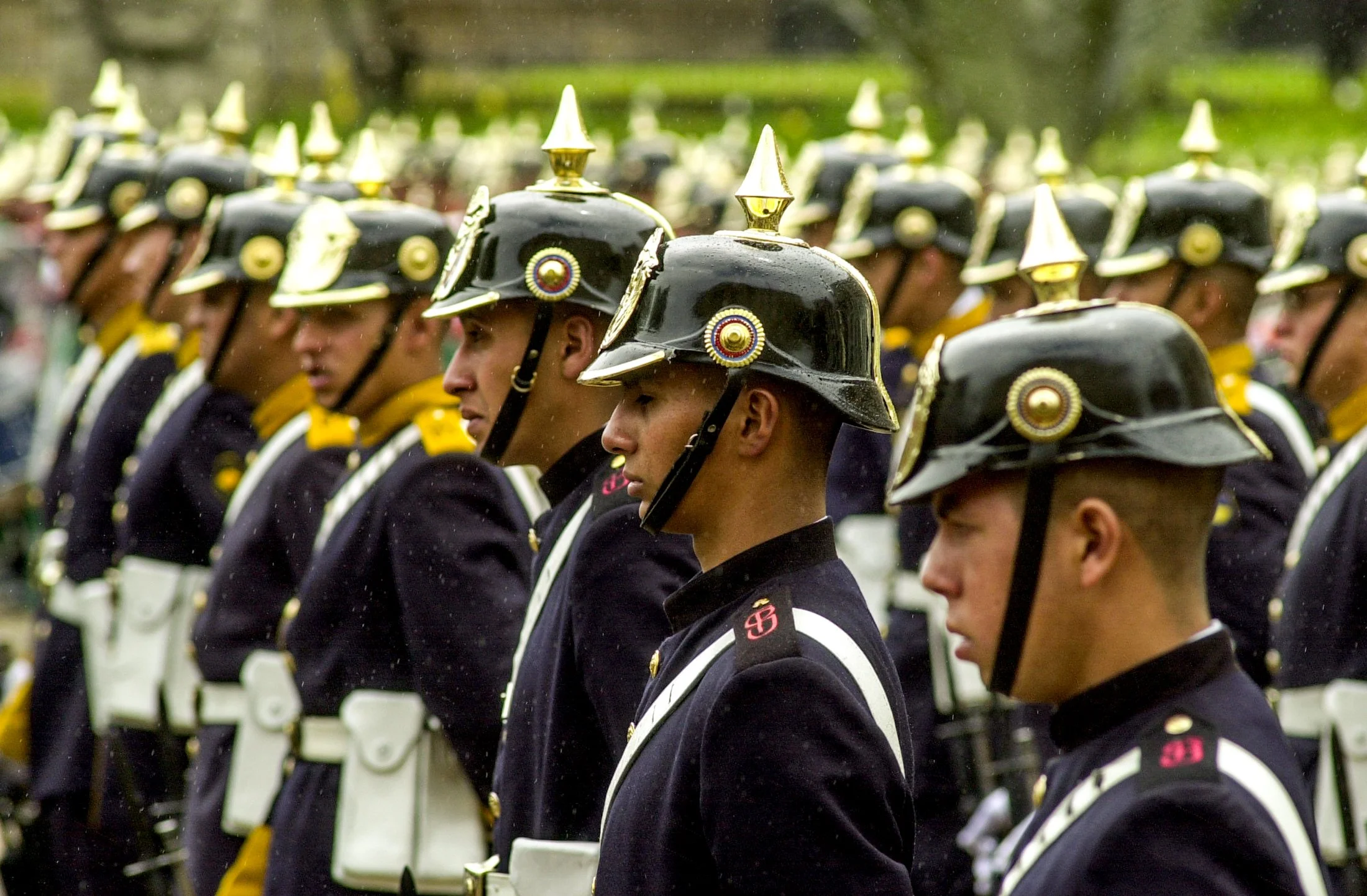 Federal troops stand at attention during a ceremony at the presidential palace in Bogota, Colombia.