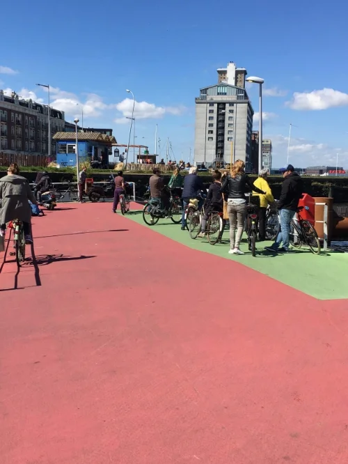 Picture 2. Passengers waiting for the ferry to arrive mostly queue on the green shoulder.