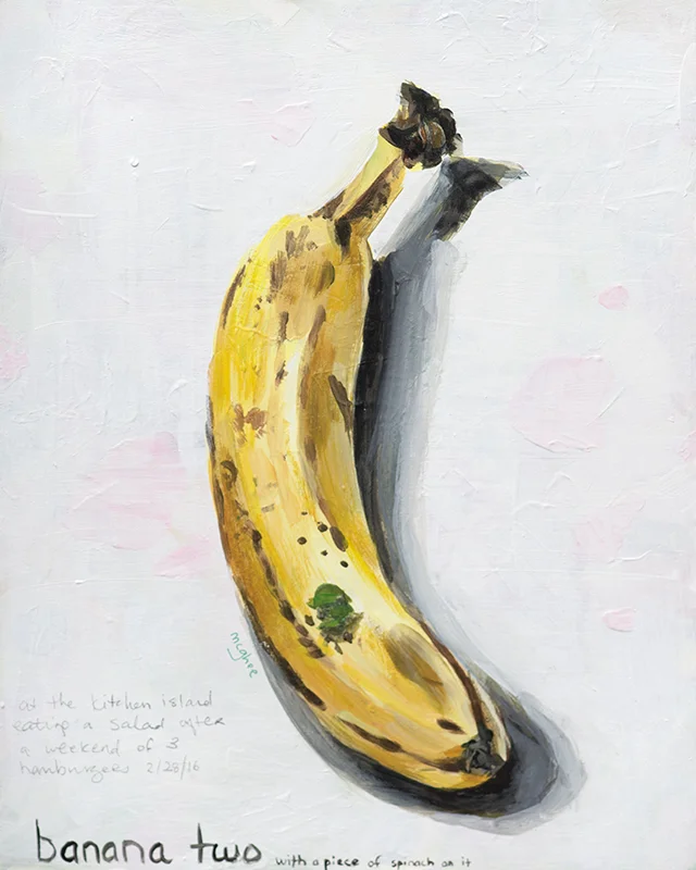 Banana Two With a Piece of Spinach On It