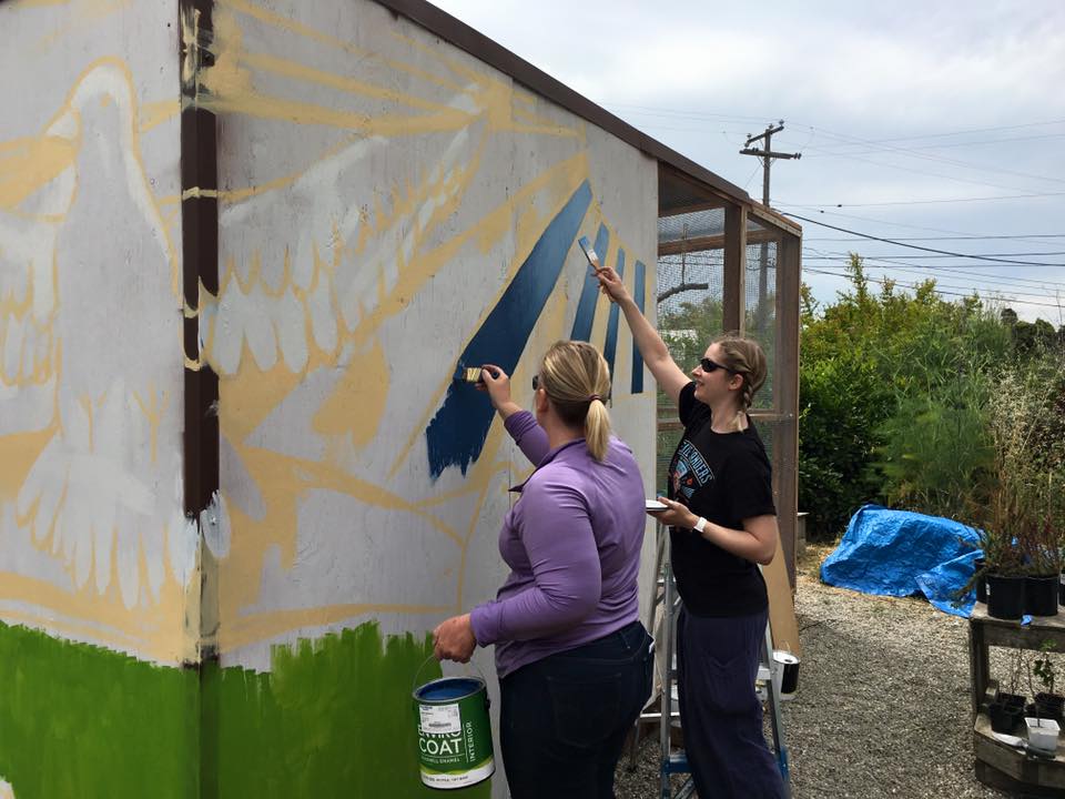 Earlier on in the painting when Ruthie and I tag-teamed the gradient in the blue sky. If you paint, you're probably aware that creating a smooth gradient in a quick-drying medium is pretty tricky. Add to that a giant space and by myself it would have been a real challenge!