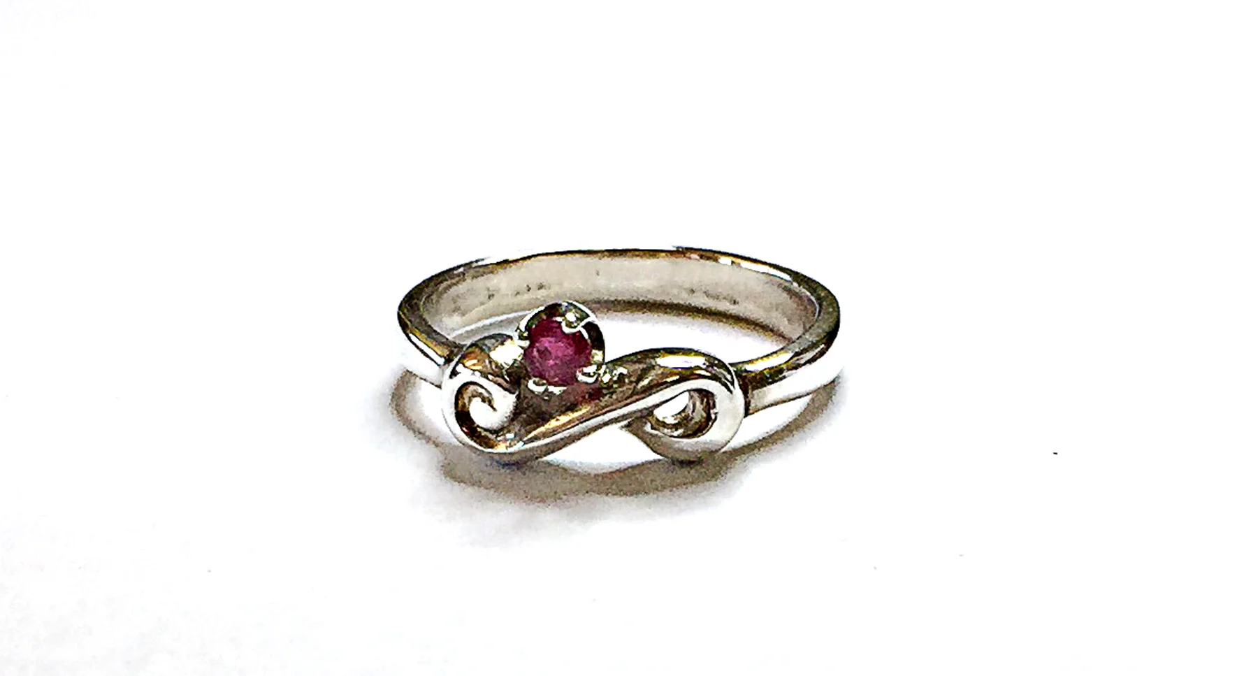 Koru ring sterling with ruby