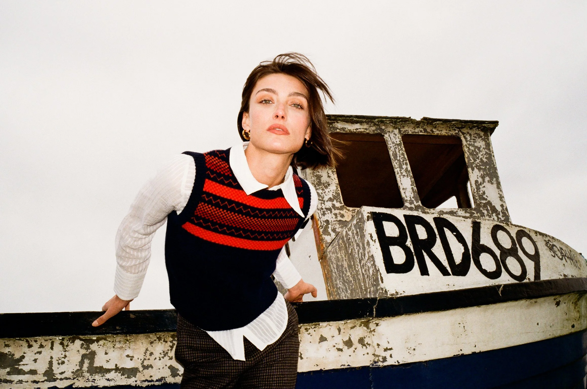 Model photoshoot boat seaside