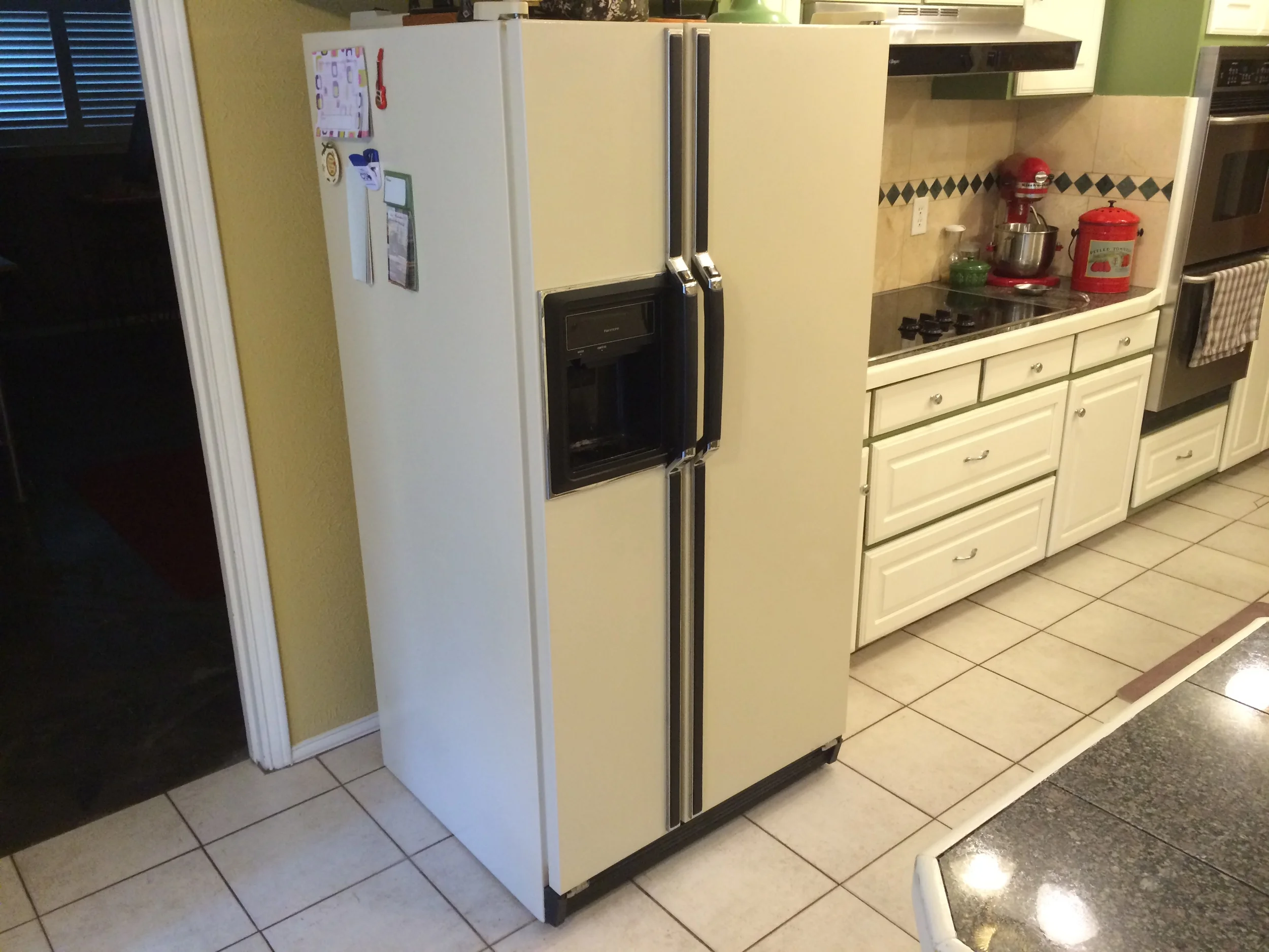 how to clean the condenser coils on a refrigerator