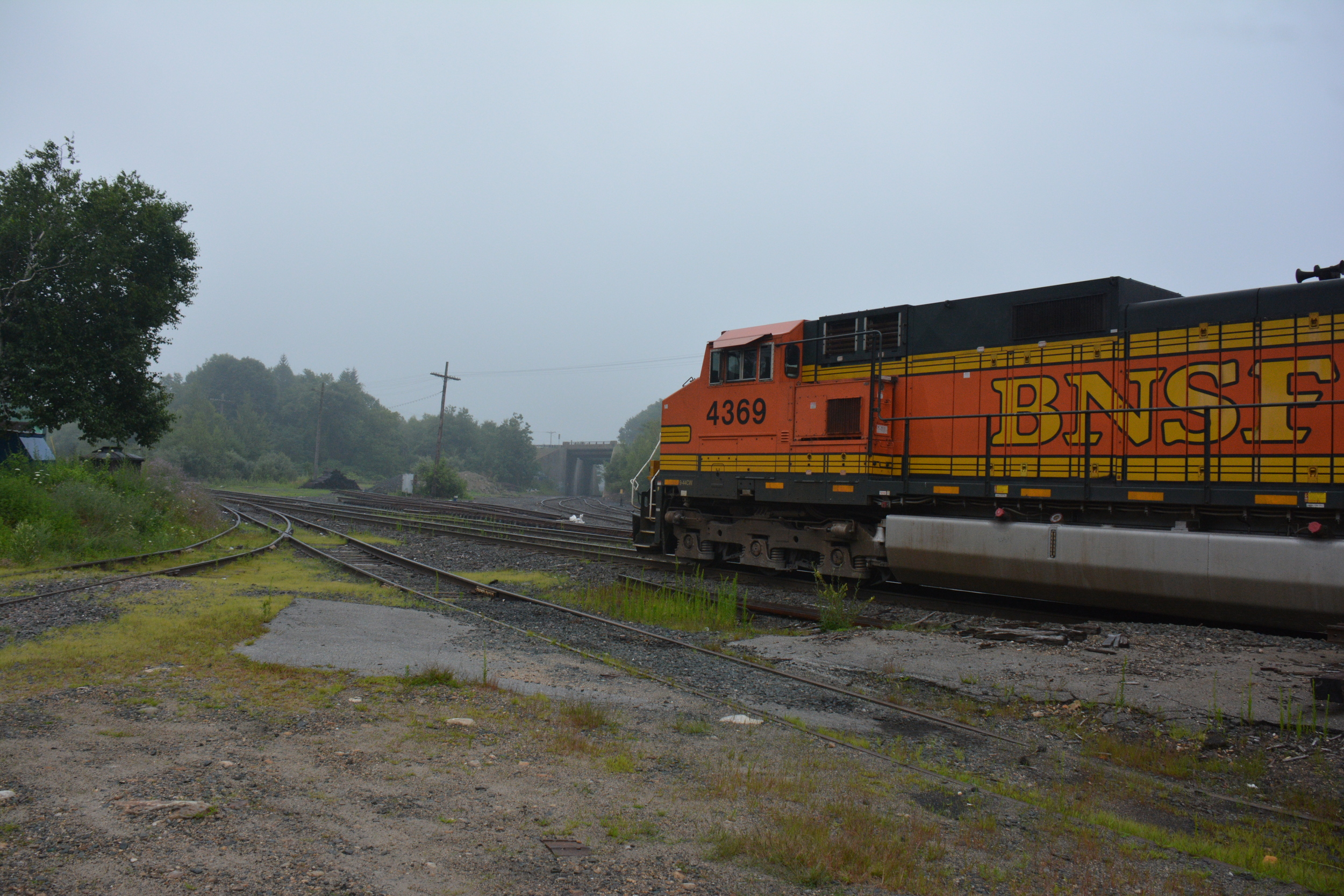  The trackage &nbsp;under the bridge to the right heads to Worcester. This is the Gardner MA Pan Am RR yards. 