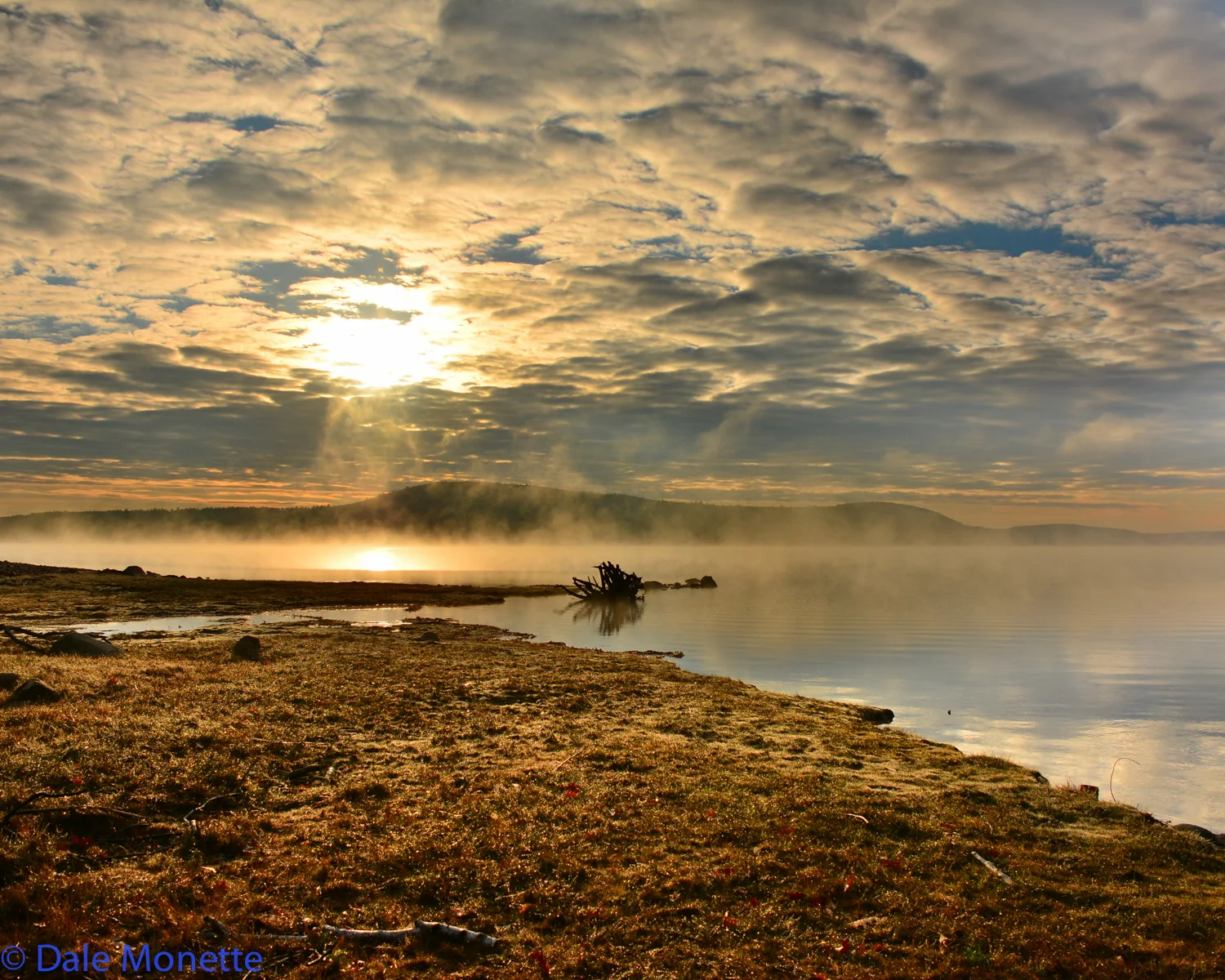 Early morning fall sun over Mount L looking east from Hop Brook Cove.