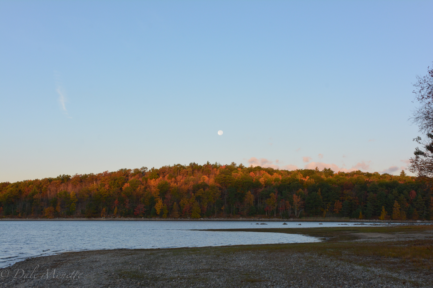 The moon setting over Moore Island on an early autumn morning.