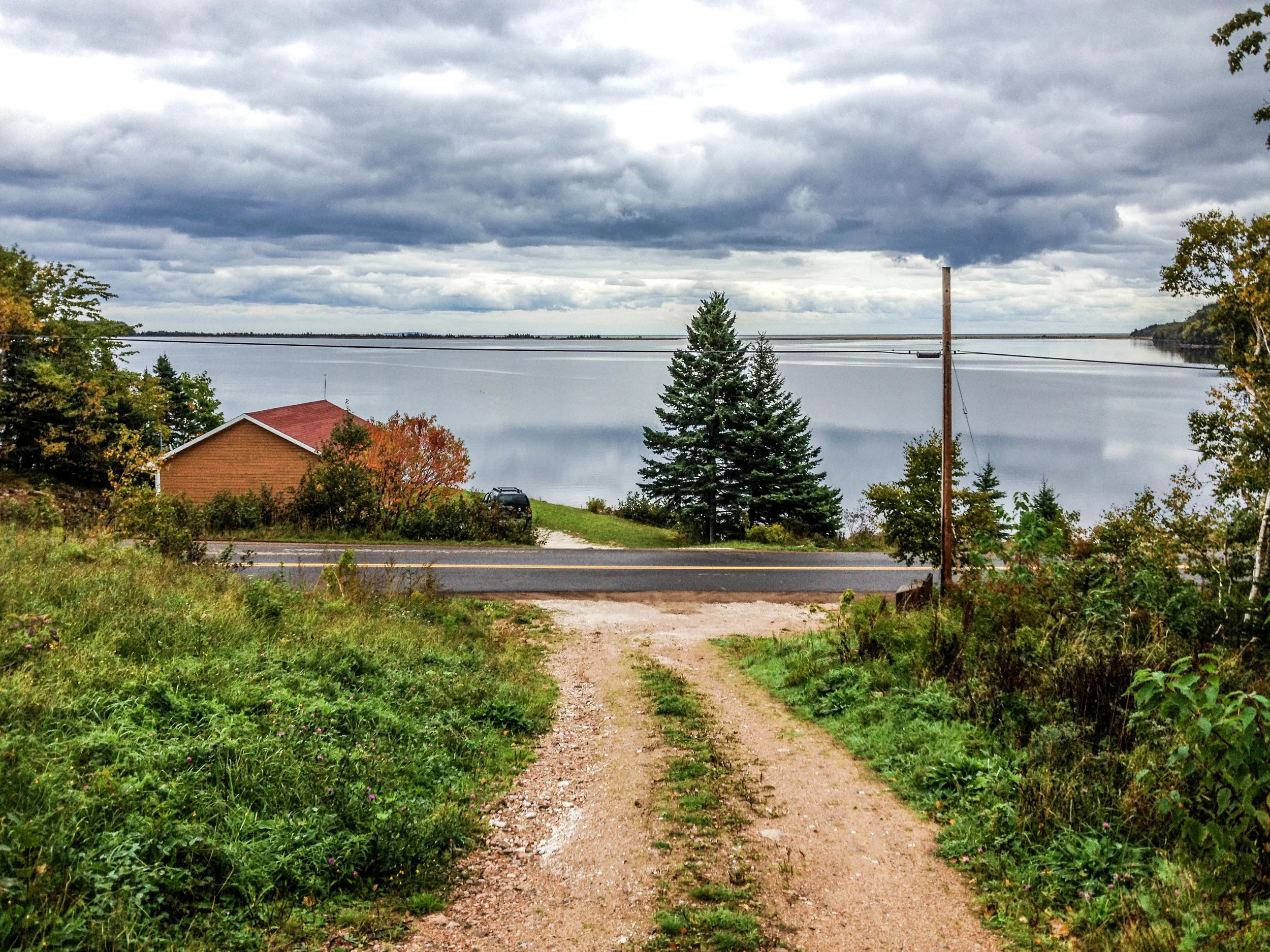 Aspy Bay, South Harbor, Cape Breton Island, Nova Scotia. Our home away from home! Looking out on the Atlantic Ocean behind a barrier beach.