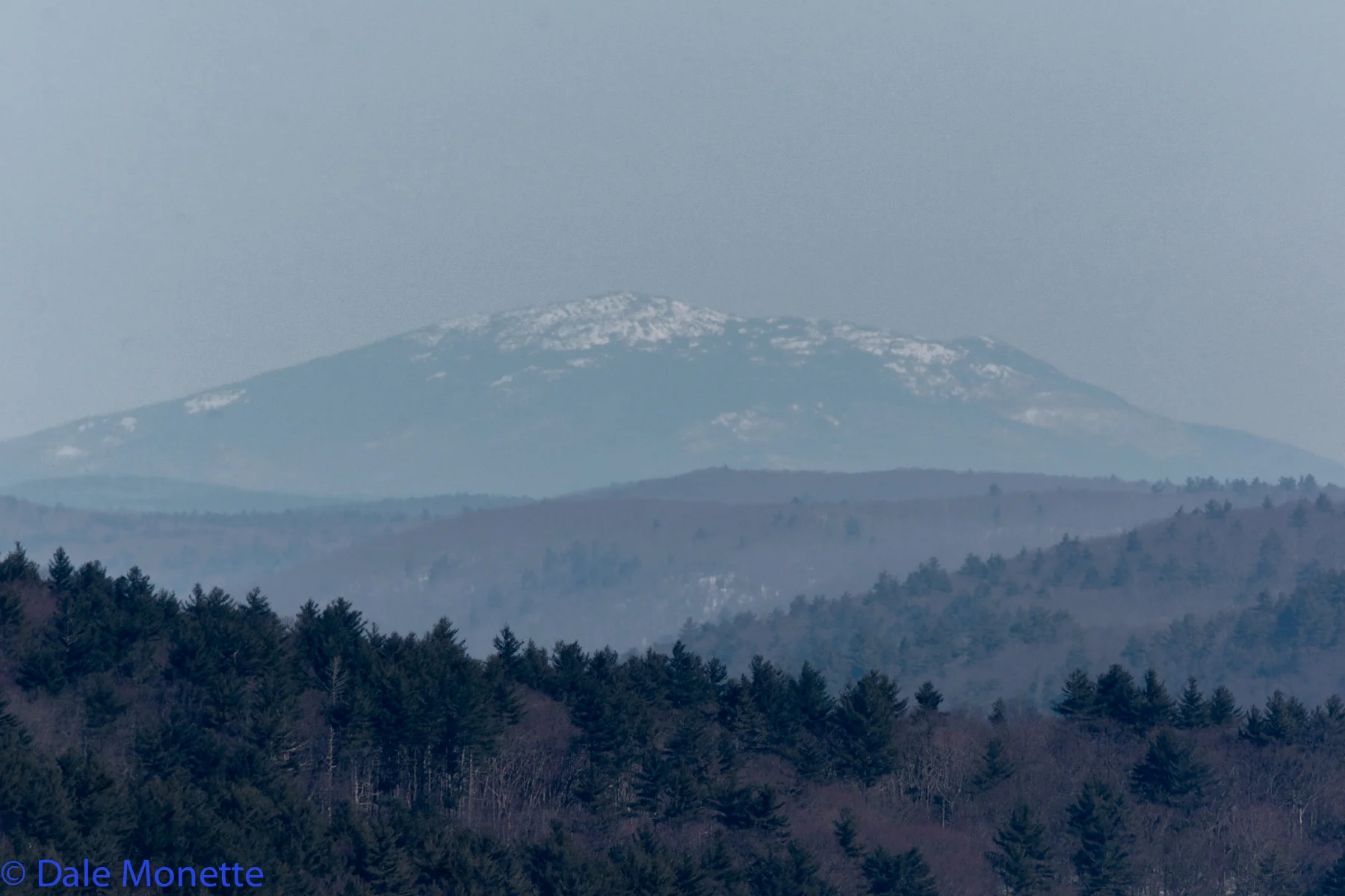 Mount Monadnock located in Dublin NH, 50 straight air miles from Quabbin. I took this on a crisp winter day with a 400mm lens.