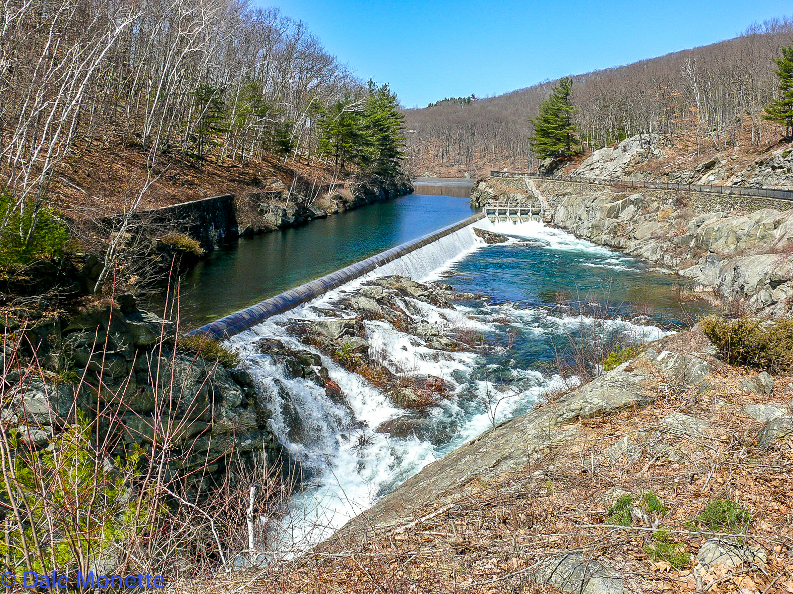 Water runs over the spillway when the Quabbin reaches full capacity which is 530 feet above sea level.