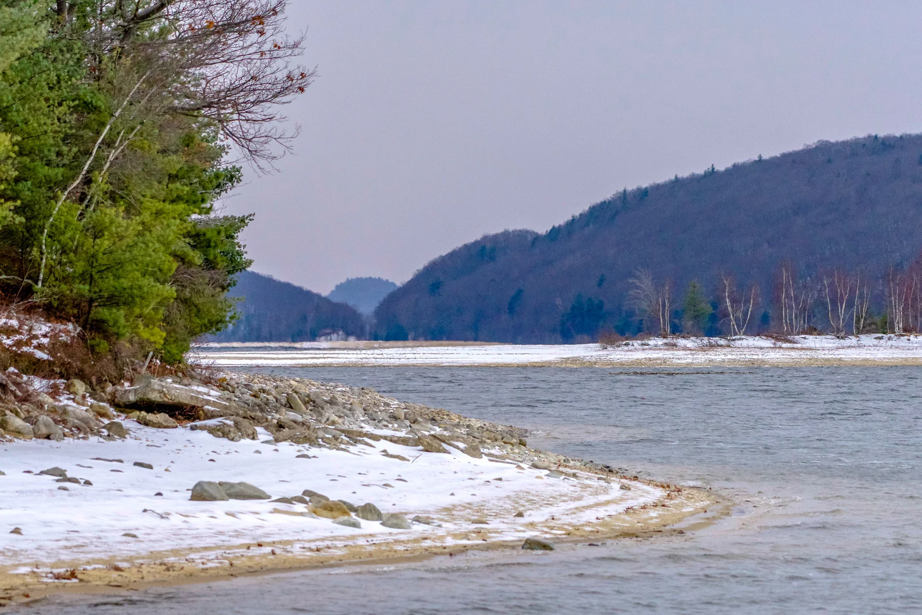 Heres a photo I took early this morning (1/4/16). The wind chill was 16 F. You can see the low water at Quabbin. In the middle you can see Mt Pomeroy's top popping up through "the pass". Mt L is on the right of it and the north tip of Mt Zion is on the left. 