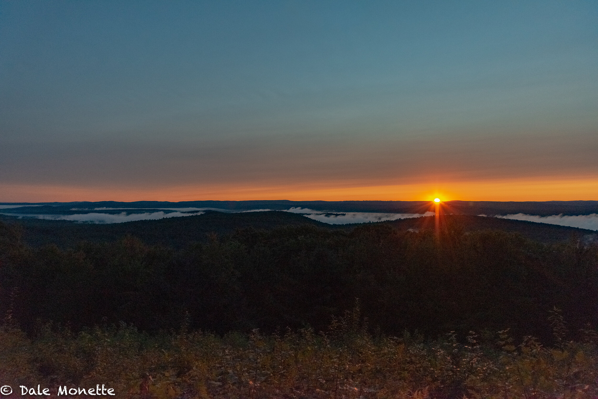   A great early fall sunrise over  the northern Quabbin watershed :) with Mt Wachusett on the right side of the sun on the horizon.  