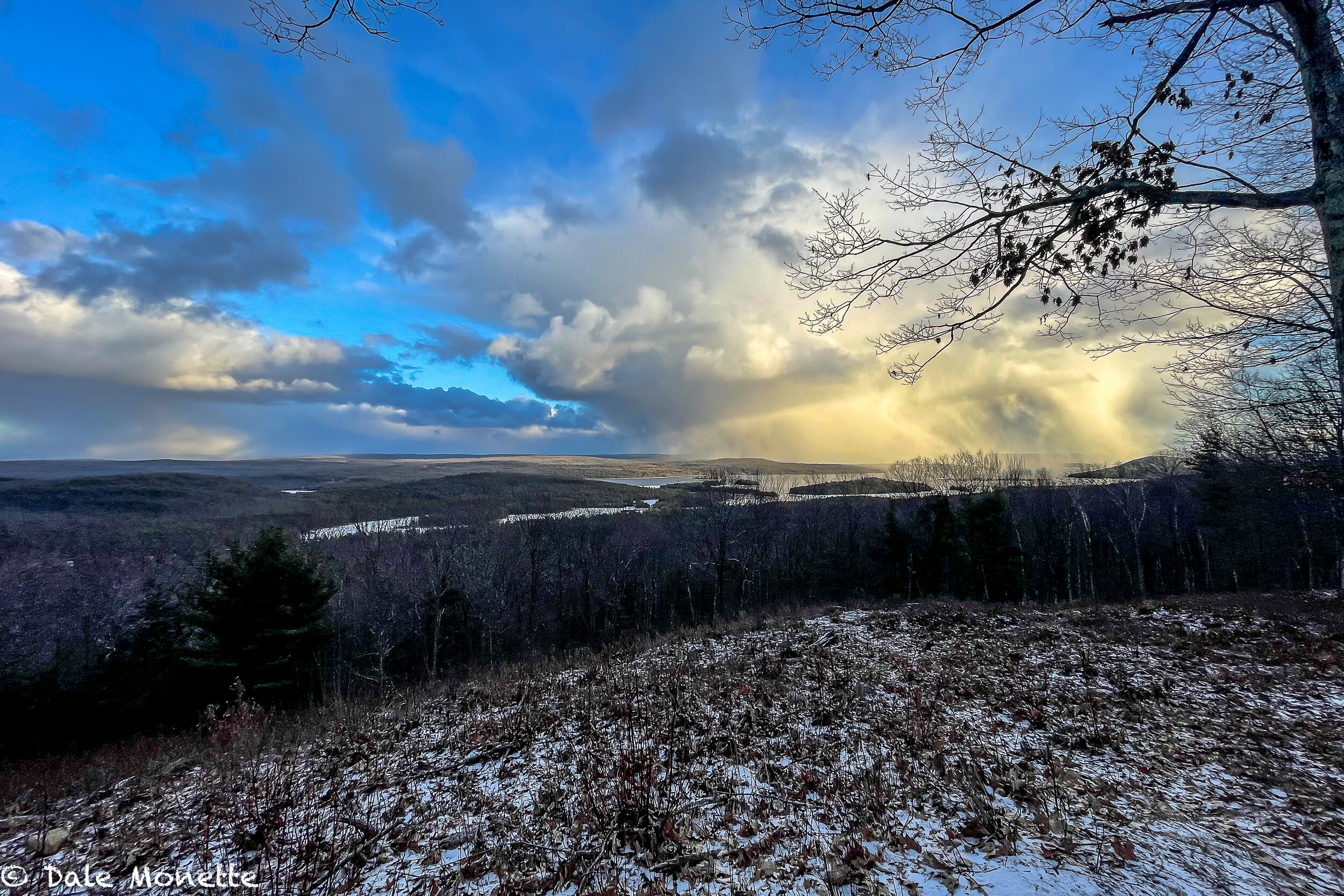   A late day snow squall moves over the northern Quabbin Reservoir. There has been some wicked skies over Quabbin lately.    