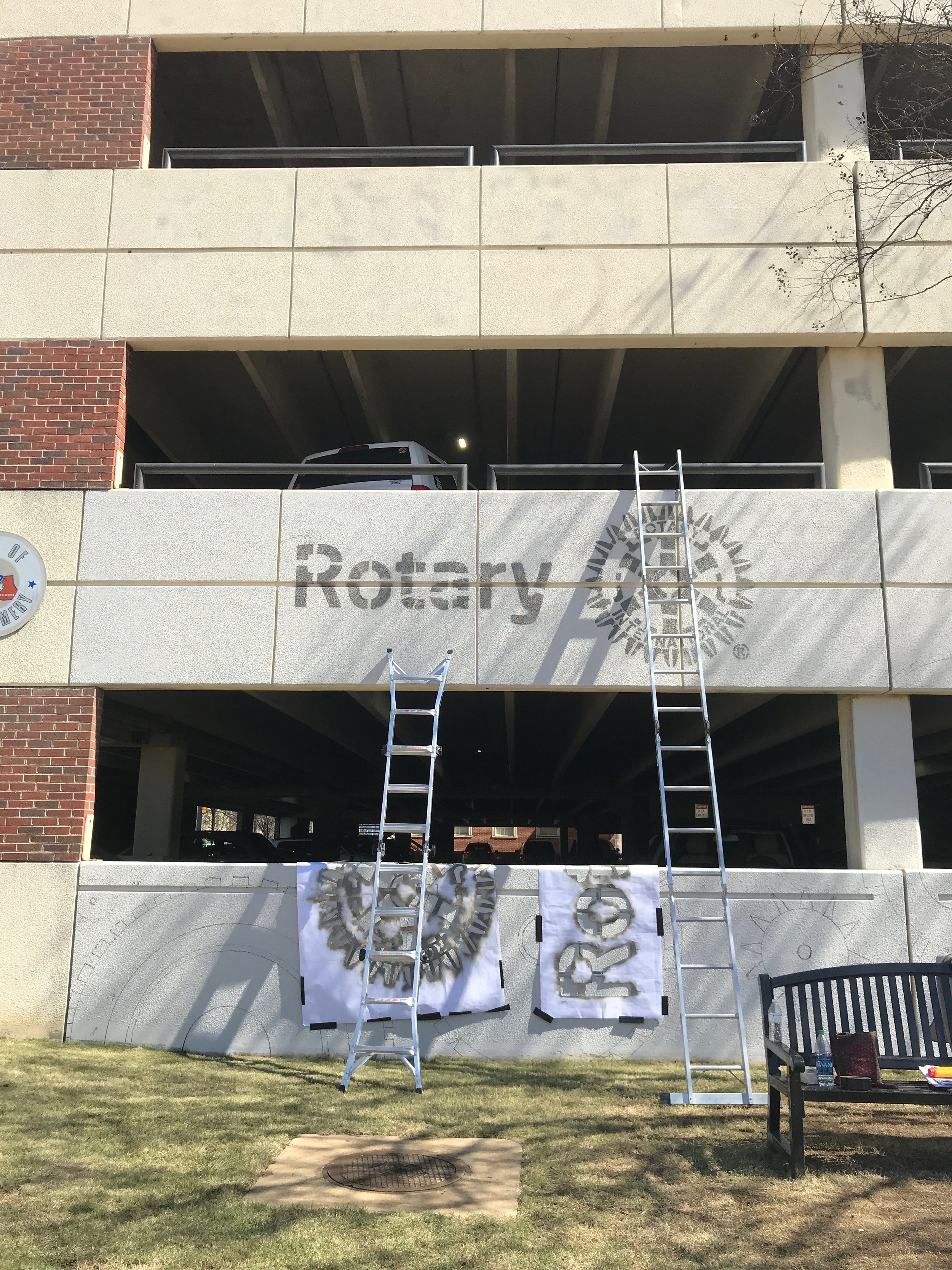  Day Four: Rotary Club logo stencil goes up! 