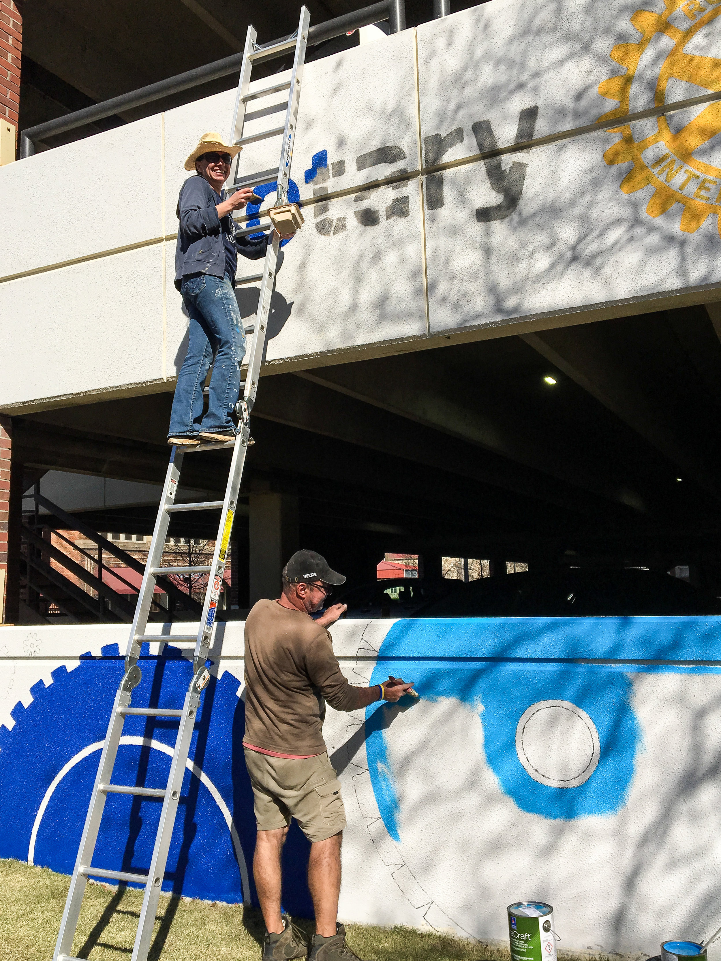  Day Four: Rotary Club logo and cog painting.&nbsp; Photo by Stina Allen  