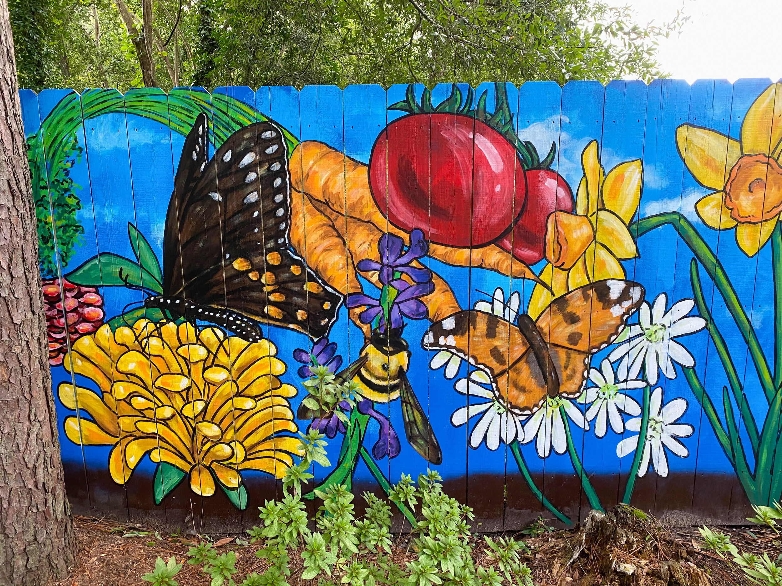   From Blight to Beauty  (detail). Old Cloverdale Community Garden mural, Montgomery, AL. 25’x6’ exterior latex on wood. October 2020. 