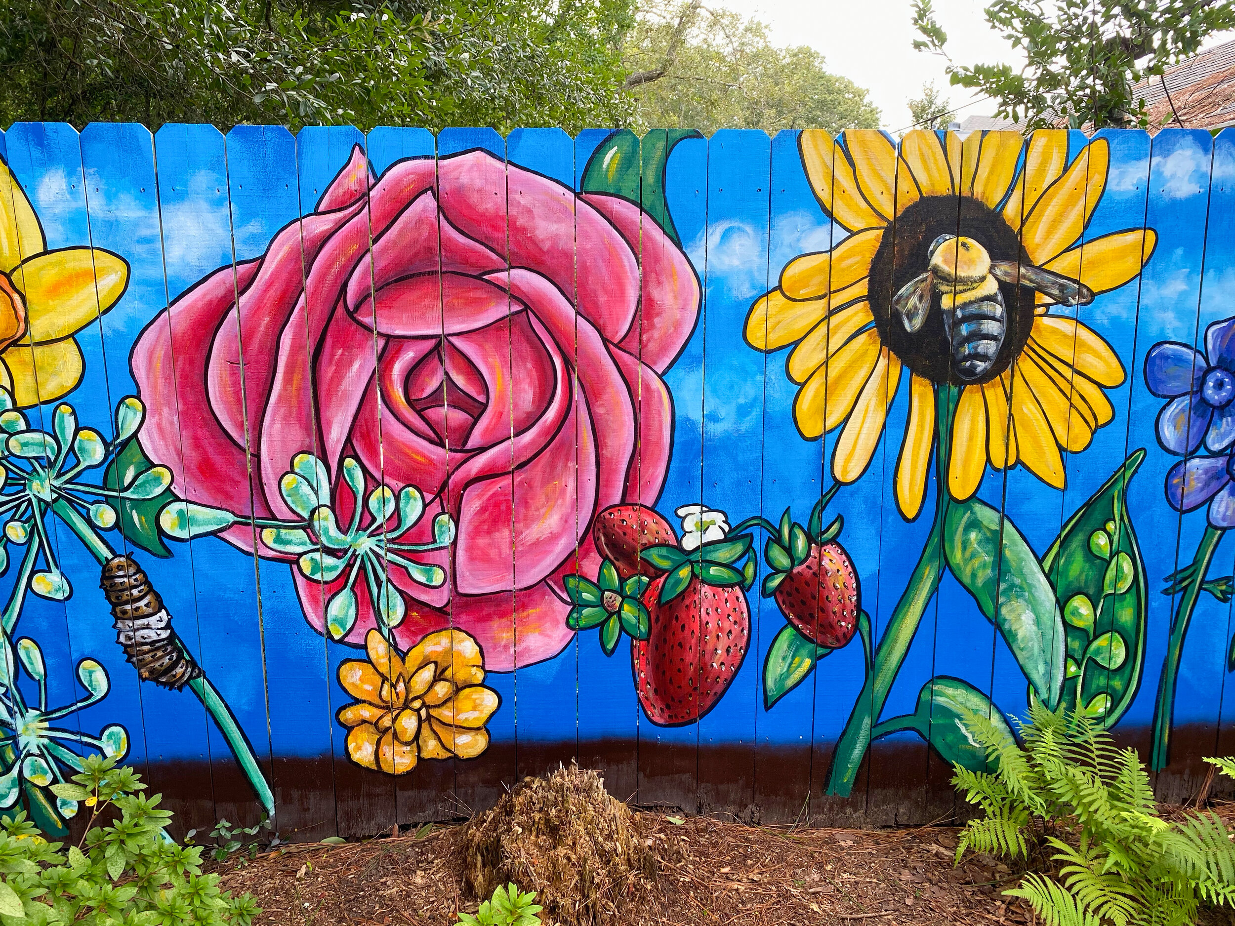   From Blight to Beauty  (detail). Old Cloverdale Community Garden mural, Montgomery, AL. 25’x6’ exterior latex on wood. October 2020. 