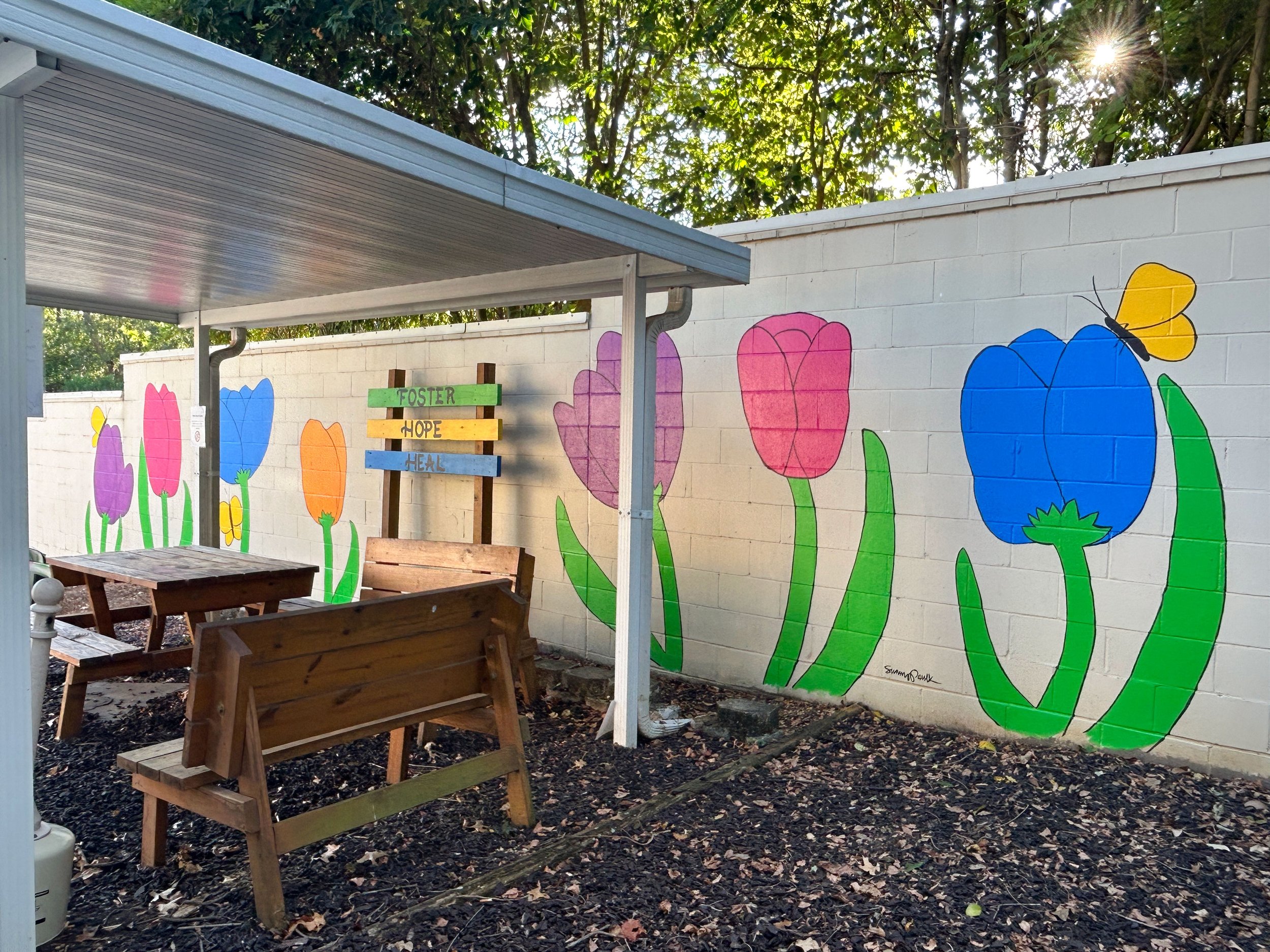   Hope and Healing.  Family Sunshine Center mural, wall #1, Montgomery, AL. 30’ x 8’ exterior latex on cinderblock. 2025. 