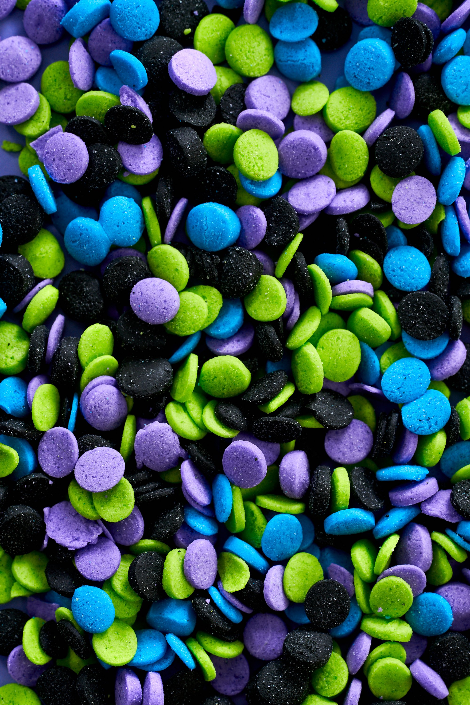 Macro shot of multi colored sprinkles, detail shot, food photography.