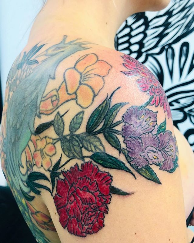 Today color work on these  beautiful flowers to honor her family. I added onto this pre-existing Peacock and we&rsquo;re going to give the Peacock the transformation next session #floral #floraltattoo #tattoo #ink #instagram #beauty #peony #gladiolus