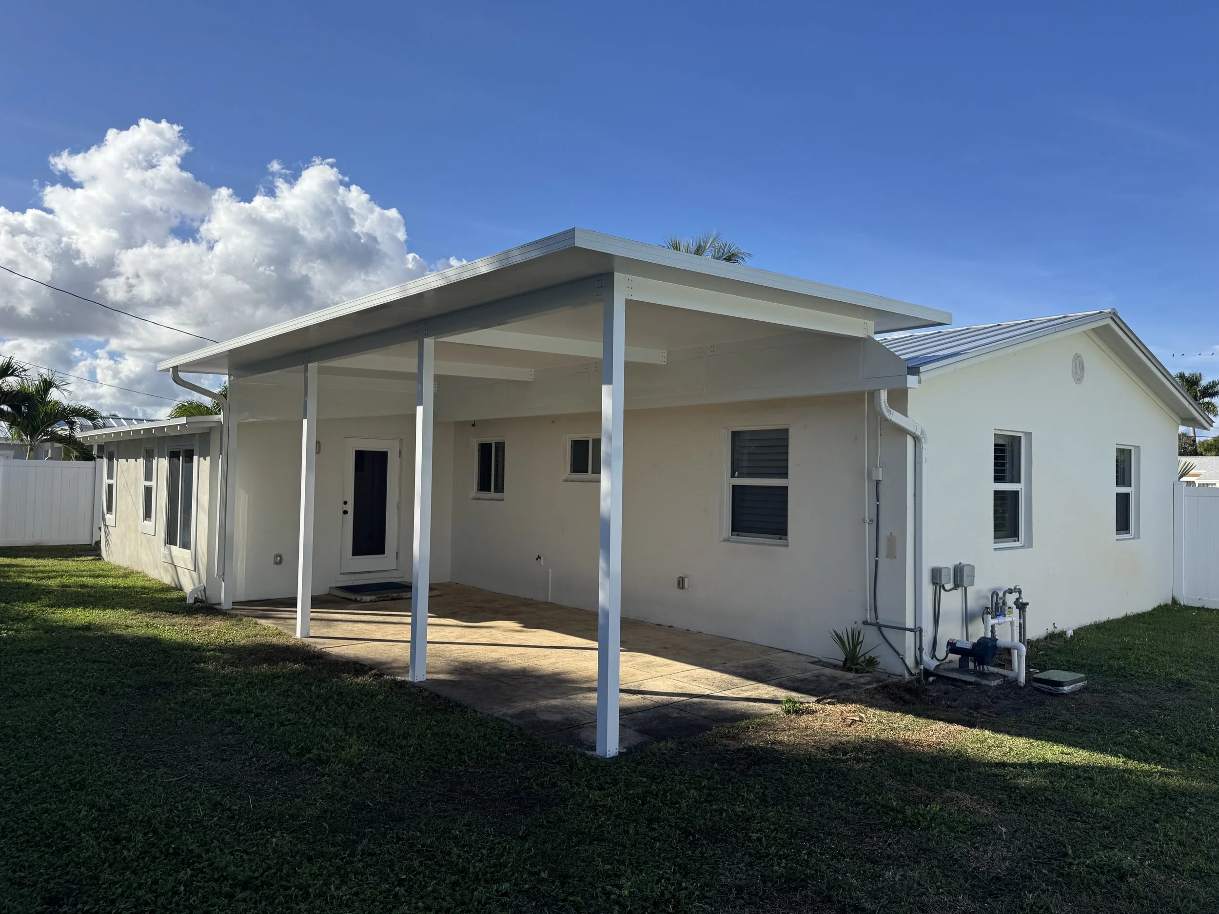  4’’ × 4’’ Posts  6’’ x 4’’ Beams  6’’ Super Gutter   3’’ Insulated Roof Panels  Customs Aluminum Flashing 