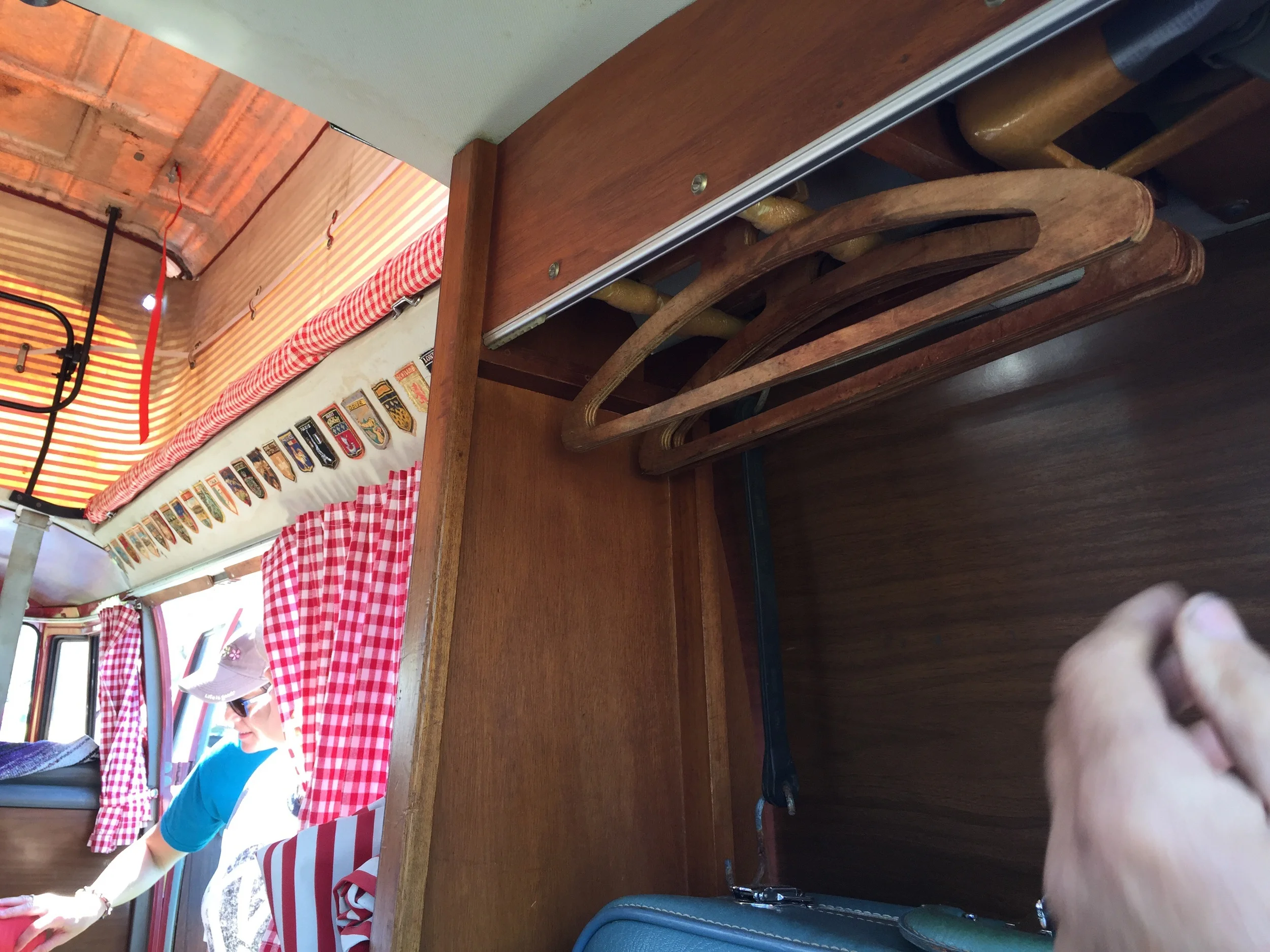 Notice the original wooden hangers