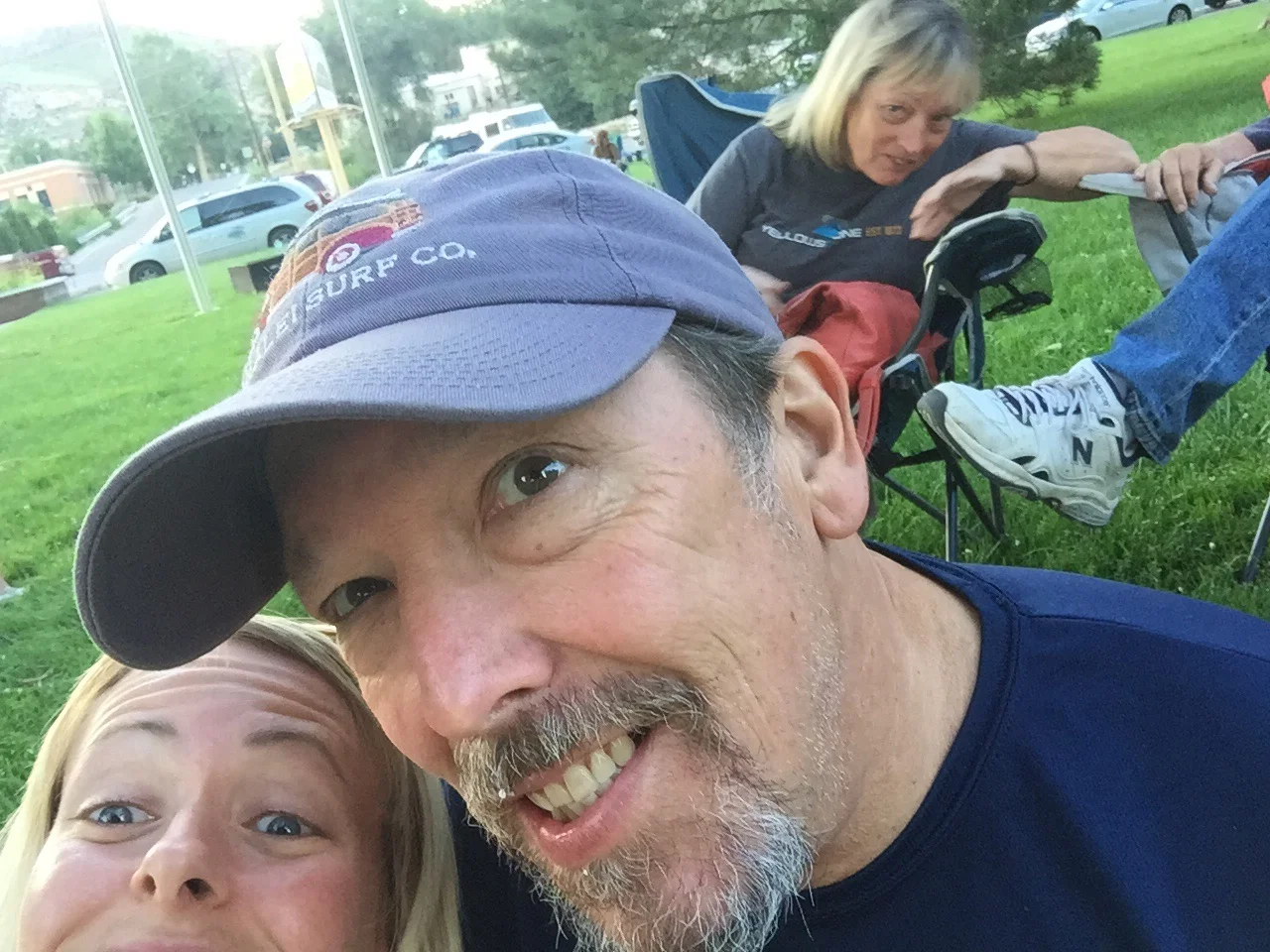 Concert in the park with family behind us.