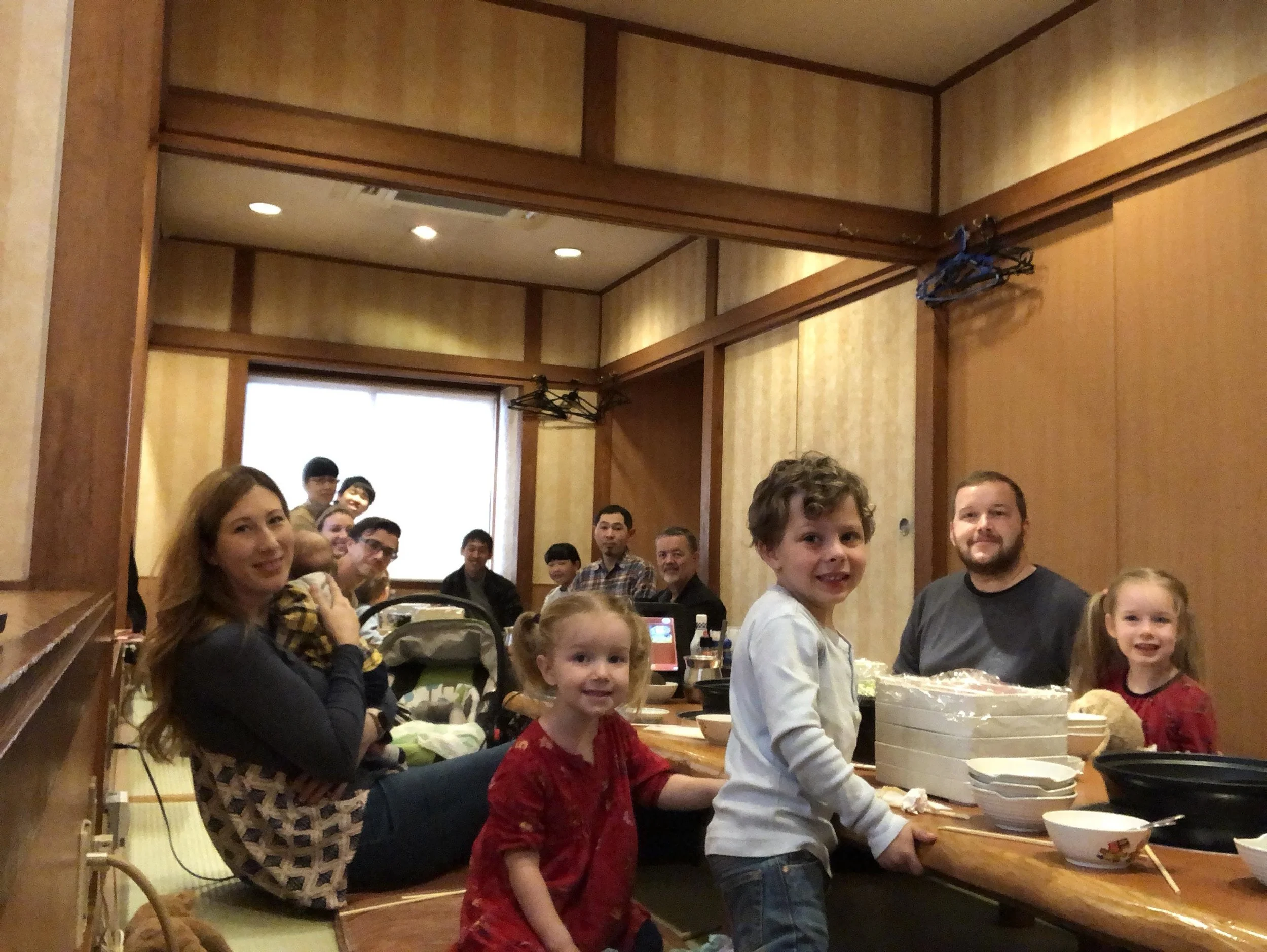 Here we are sharing a traditional Japanese meal with a pastor and his family. Japanese like to eat their meals sitting down on comfortable Tatami mats.