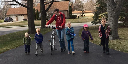 Kids Welcoming Justin Home from Working At the Library