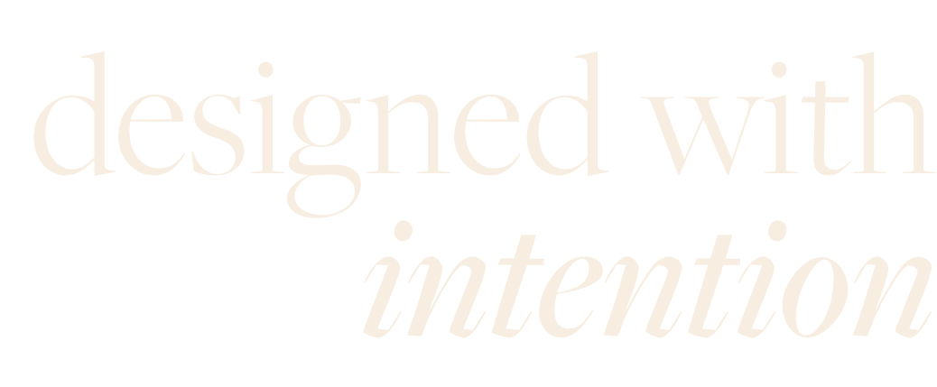 Text that reads "designed with intention" in a stylized font on a black background.