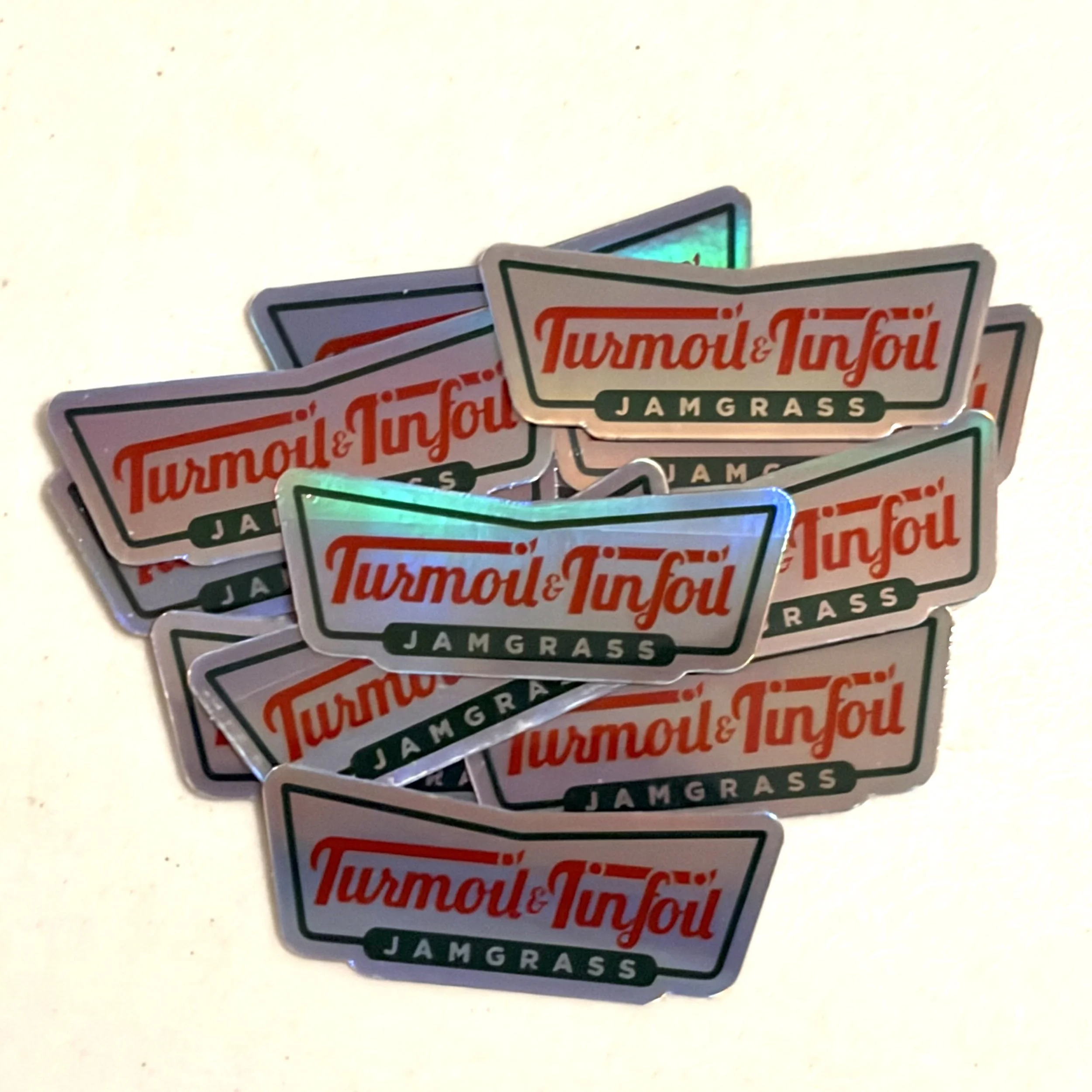 Turmoil and Tinfoil sticker.jpeg