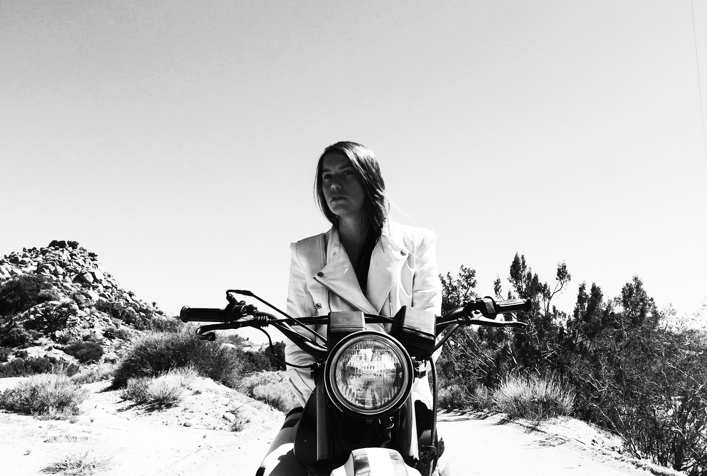 Ali Beletic riding her motorcycle.jpg