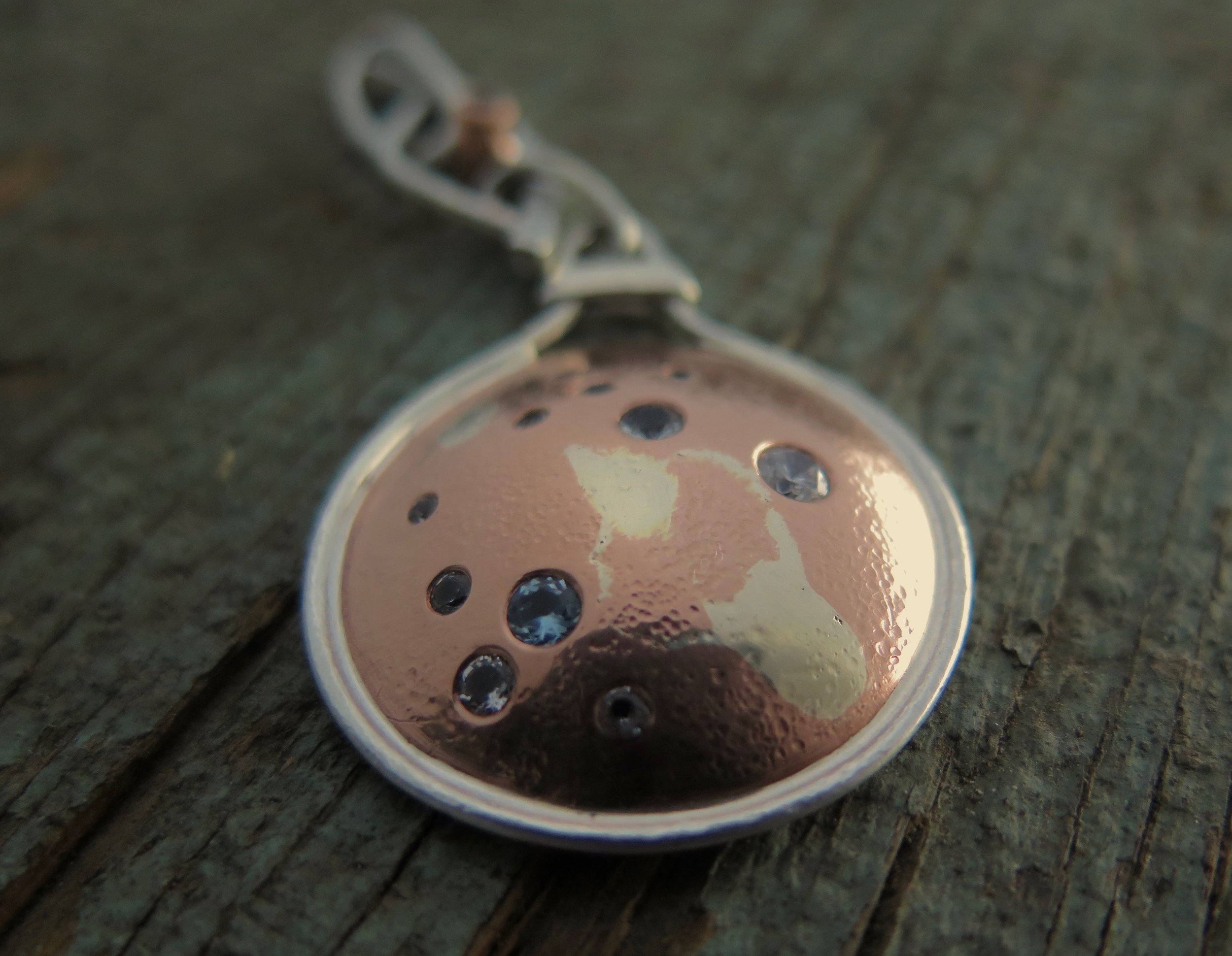kinetic pendulum pendant