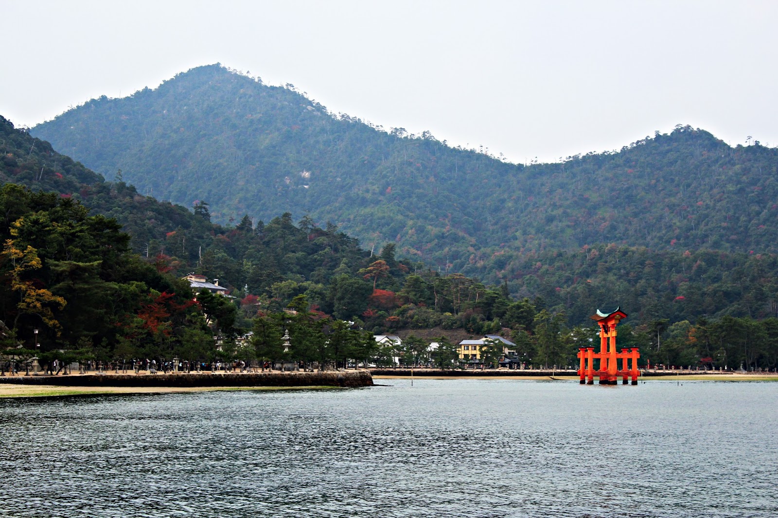 Photo by Brittany Butters ---> Far off shot of the torii gate. I took it while I was riding the ferry. I included this picture because you can see just how big the torii gate really is... 