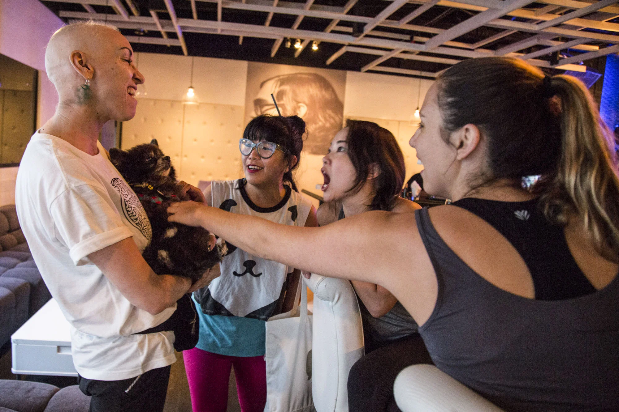  Wittmier excitedly catches up with friends during the Republikʻs first-ever yoga event, ʻYoga Loves CWʻ, an event that was put together in support of Christa.  