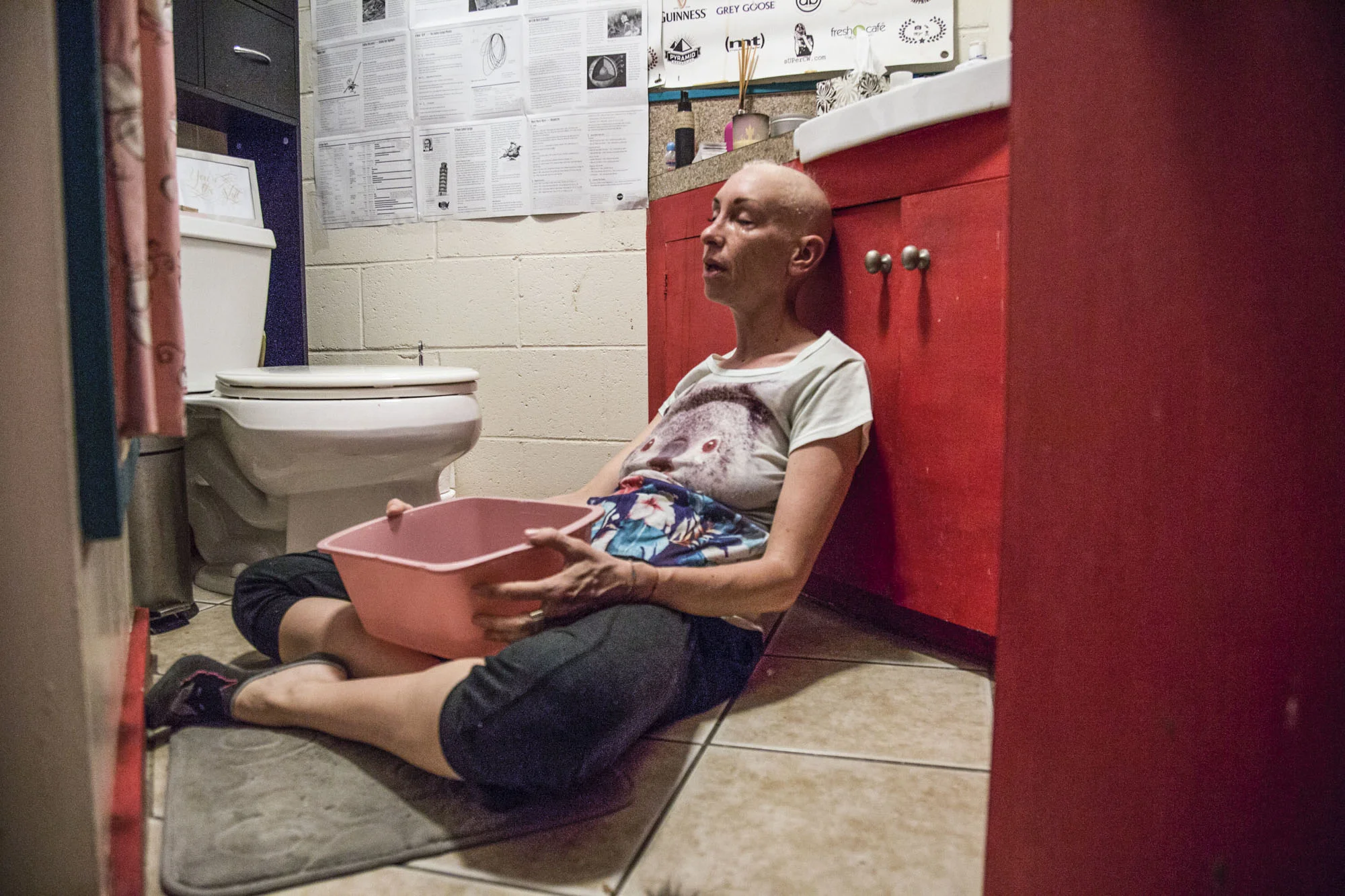  Wittmier closes her eyes after throwing up in her Honolulu, HI home.  