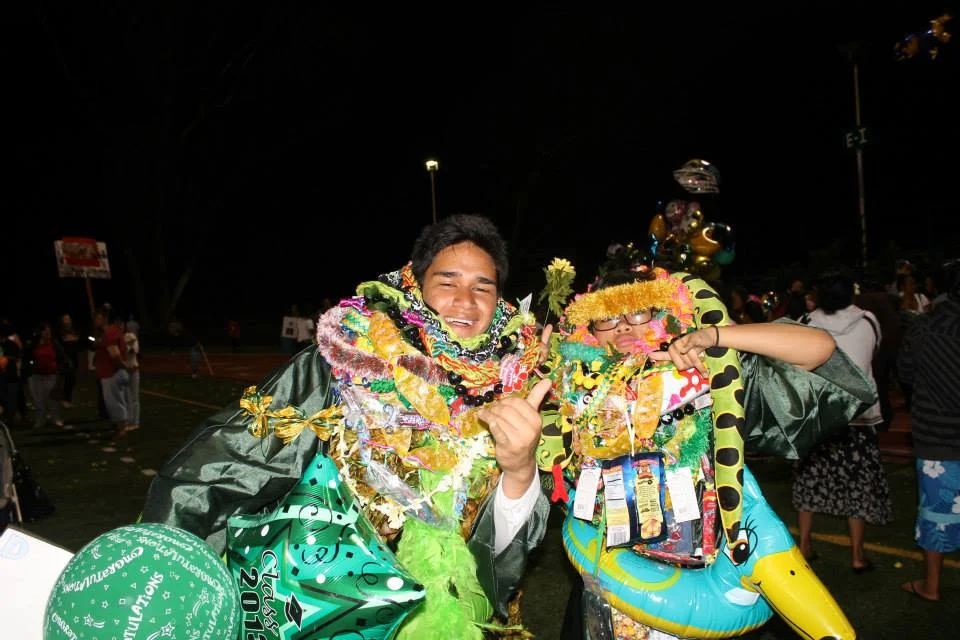 My best friend, Ezra Hunkin, and I when we graduated from Leilehua High School in 2013.
