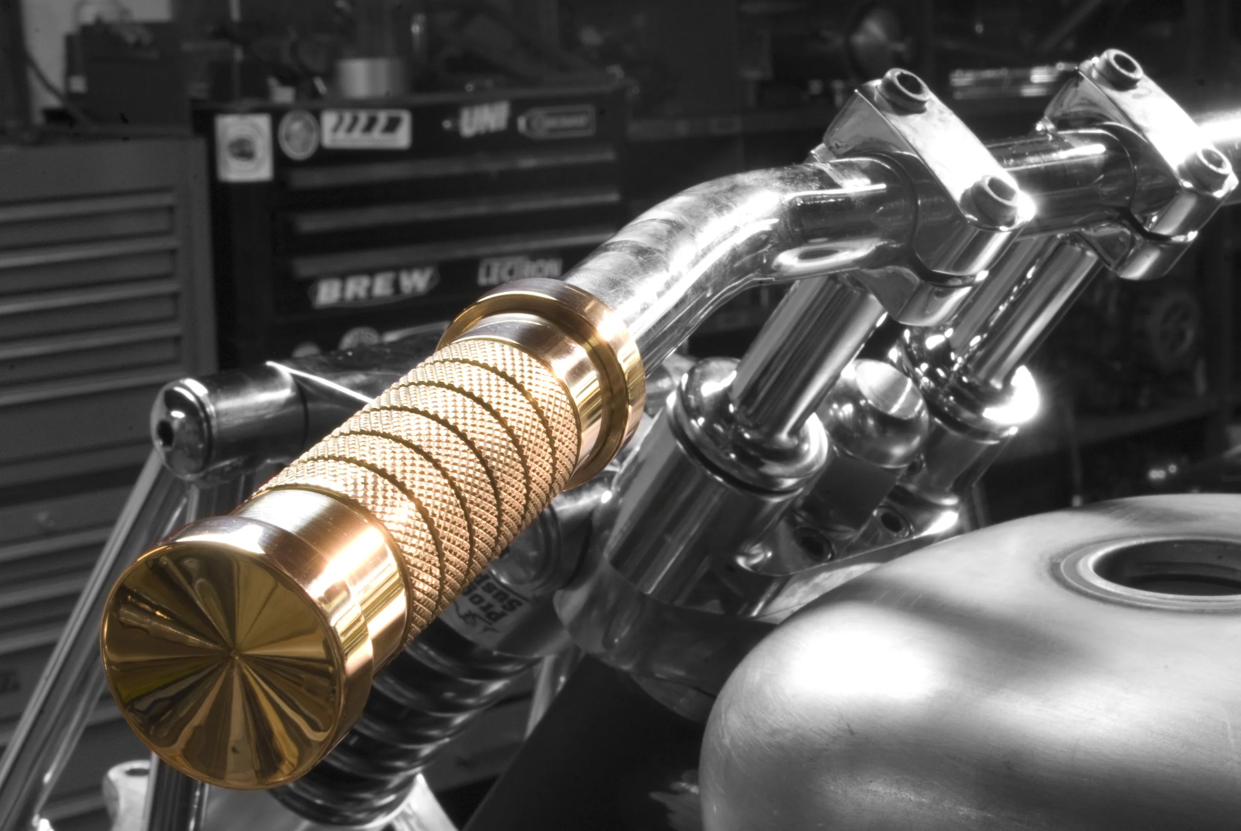 deep_six_cycles_b&w_brass_polished_grips.jpg