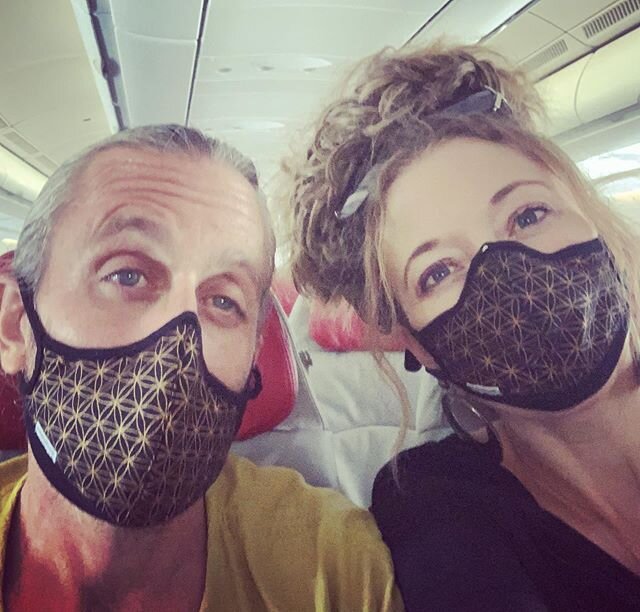 Flower of Life face mask twinsies!! My travel buddy and I did a visa run today to Kuala Lampur..., and I bought him a flower of life mask to match mine. He sells amazing copper laser cut flower of life stickers that i have purchased and stuck on ever