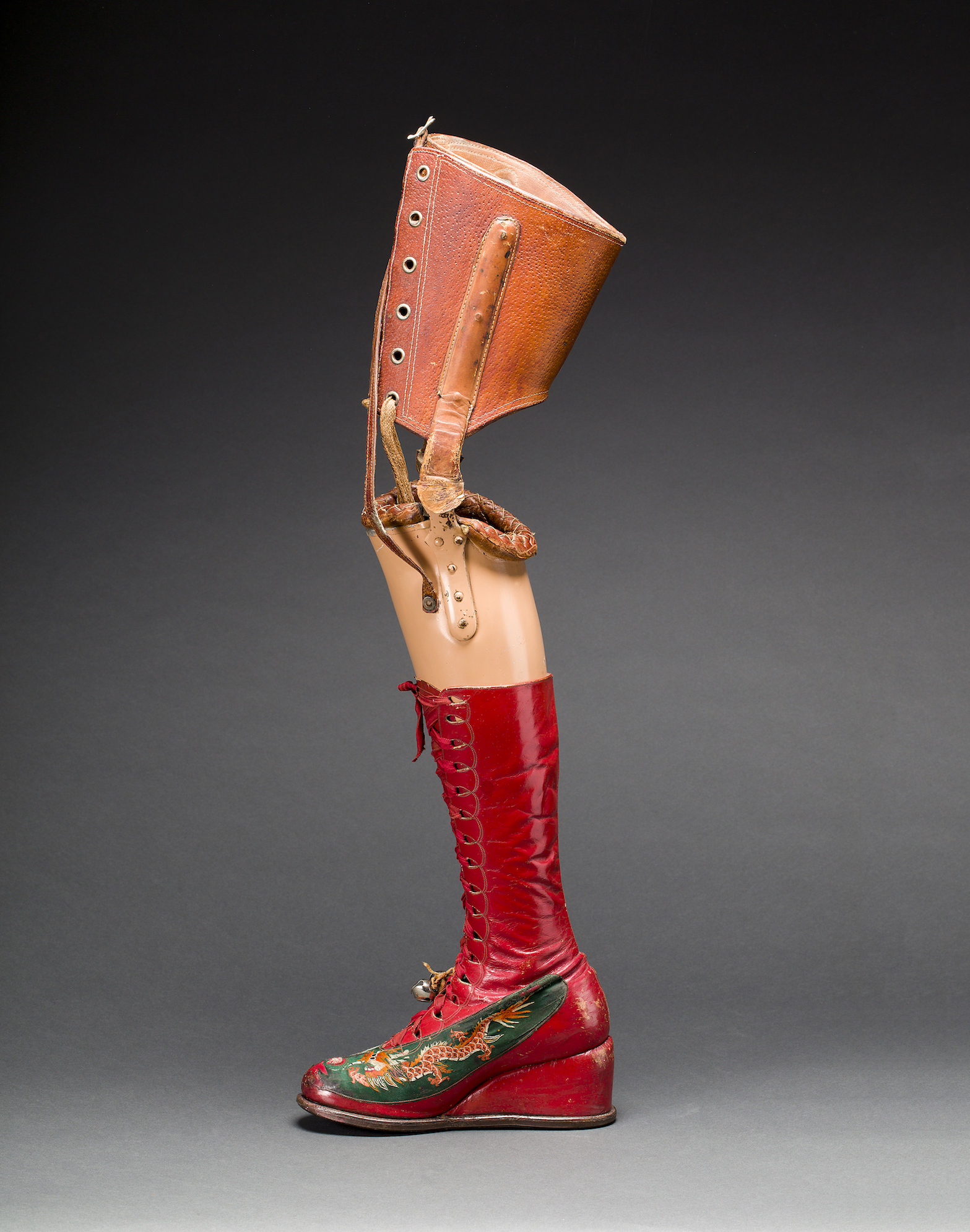 Prosthetic leg with leather boot. Appliquéd silk with embroidered Chinese motifs. Photograph Javier Hinojosa. Museo Frida Kahlo. © Diego Riviera and Frida Kahlo Archives, Banco de México, Fiduciary of the Trust of the Diego Riviera and Frida Kahlo Museums. 