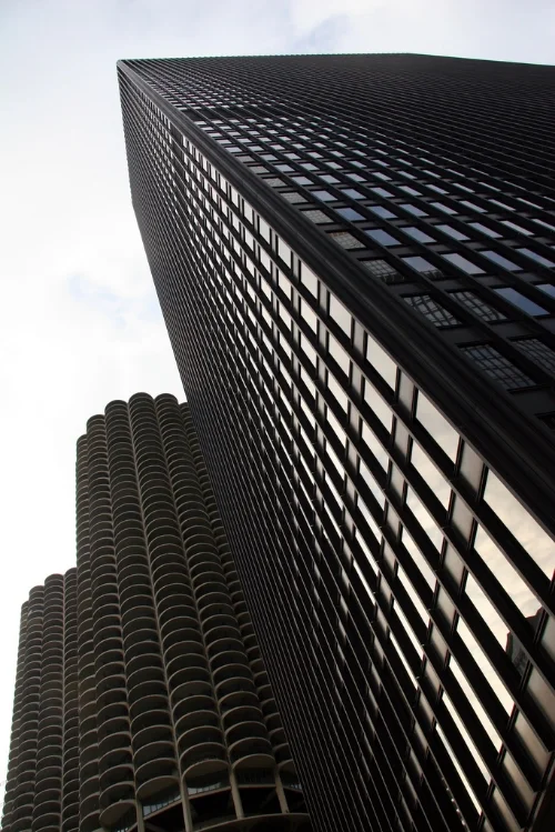  Mies van der Rohe - IBM Building next to the circular Marina Towers by Bertrand Goldberg