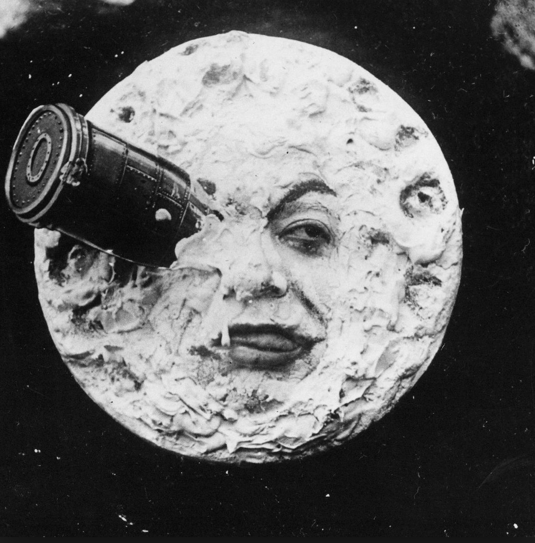 The moon from "A Trip to the Moon" with a rocket implanted in it.