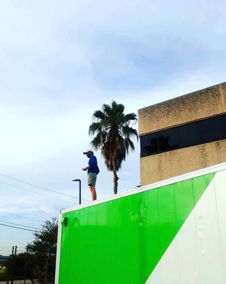 Andrew hanging out on top of one of the Acre in a Box LGMs in Houston, TX (Photo Credit AIAB Instagram).