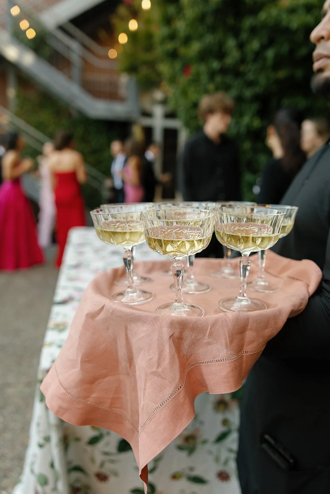 Champagne in coup glasses on tray during cocktail hour – Elegant Kohl Mansion Wedding | L’Relyea Events