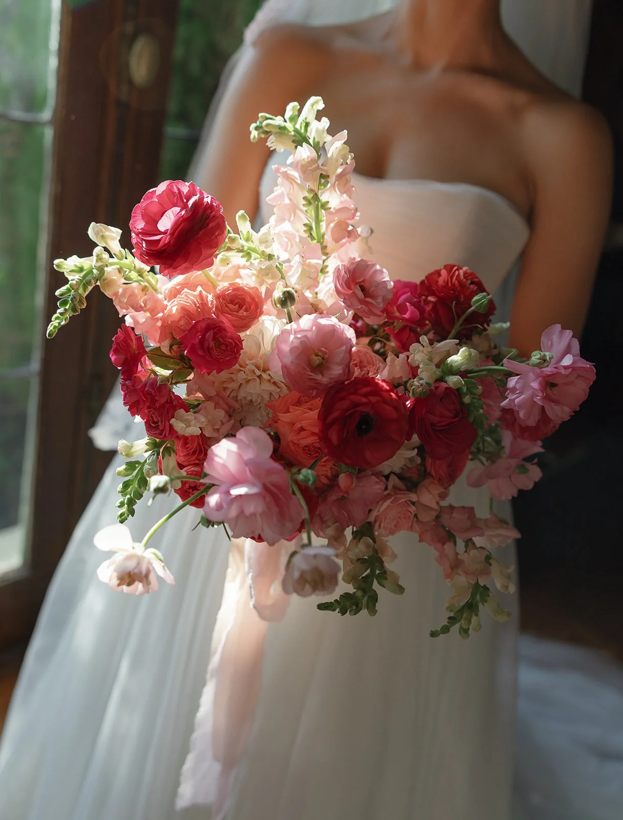 Bride Holding Pink and Red Bouquet– Kohl Mansion Wedding | L’Relyea Events